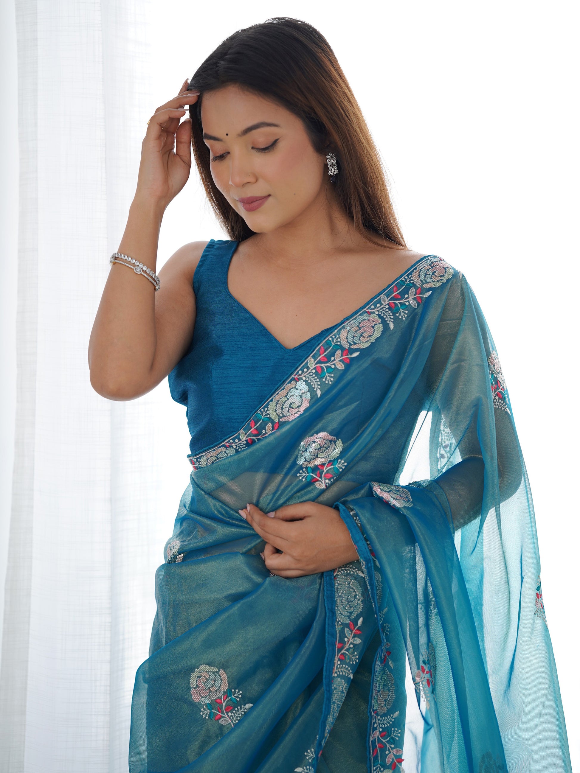 Captivating Teal Blue Thread Work Sequins Net Saree With Blouse
