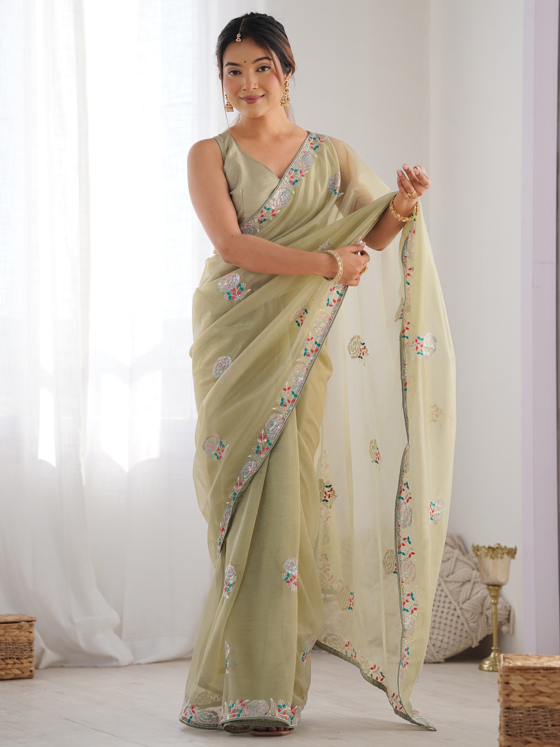 Spectacular Pista Green Sequins Net Festival Wear Saree With Blouse