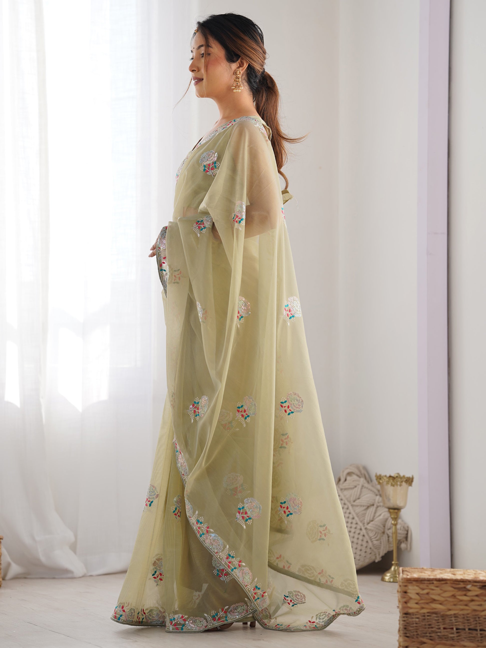 Spectacular Pista Green Sequins Net Festival Wear Saree With Blouse