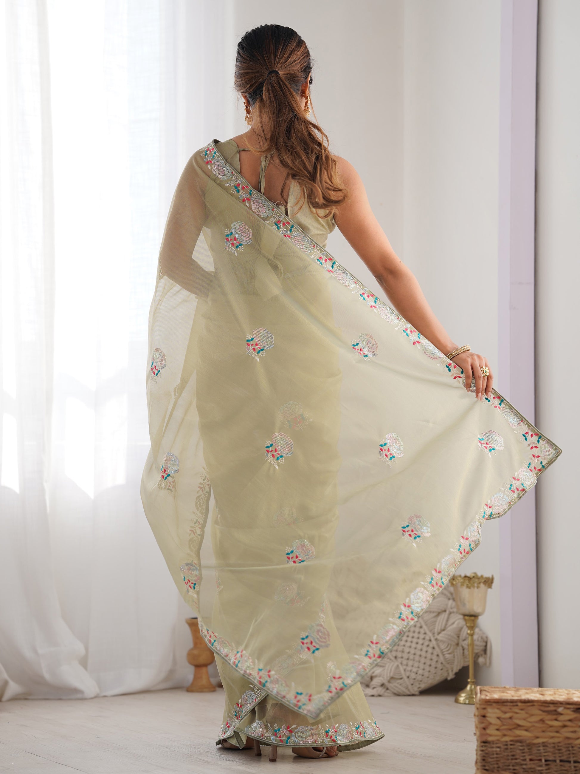 Spectacular Pista Green Sequins Net Festival Wear Saree With Blouse