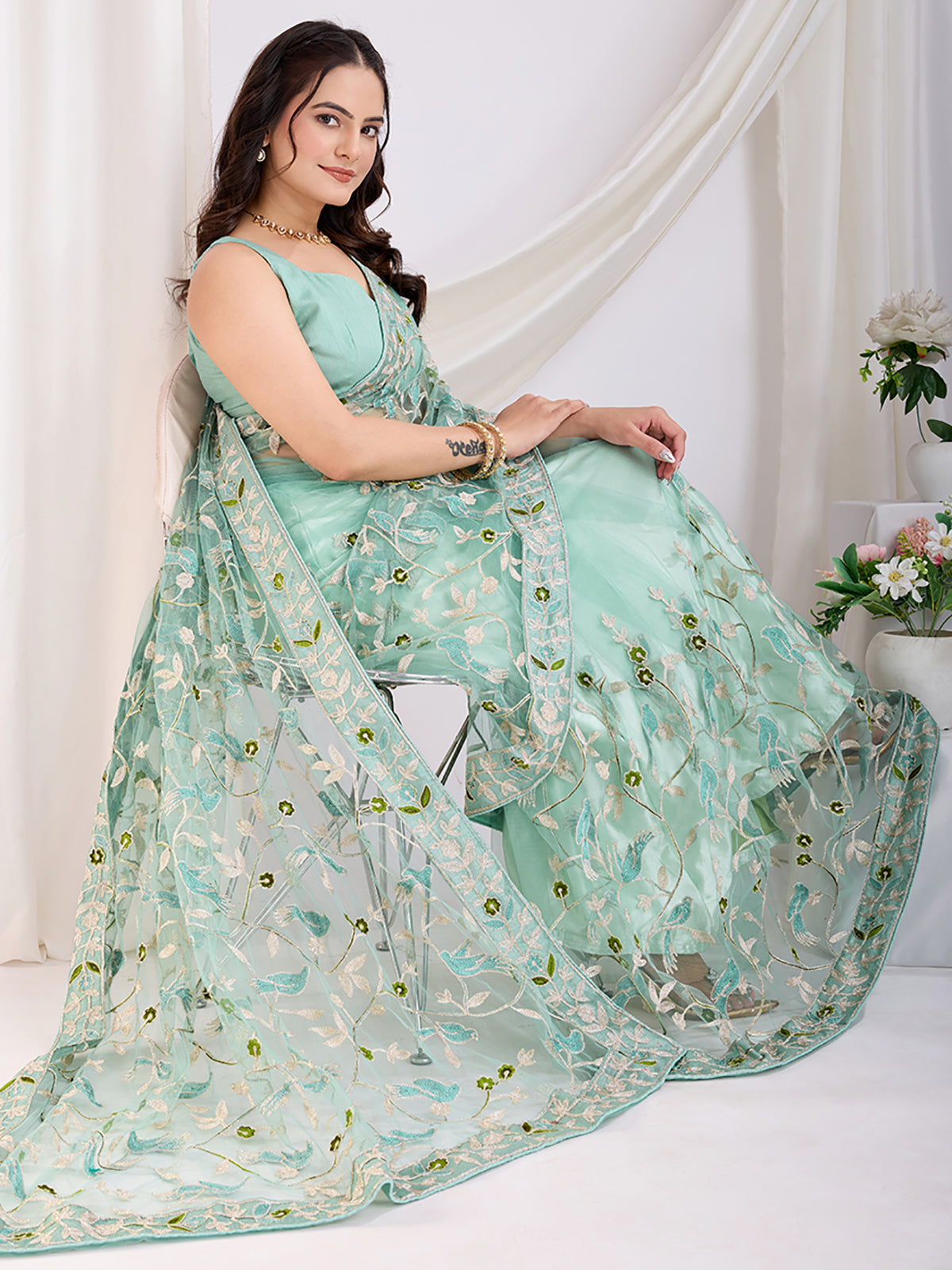 Incredible Sea Green Thread Embroidery Net Designer Saree With Blouse