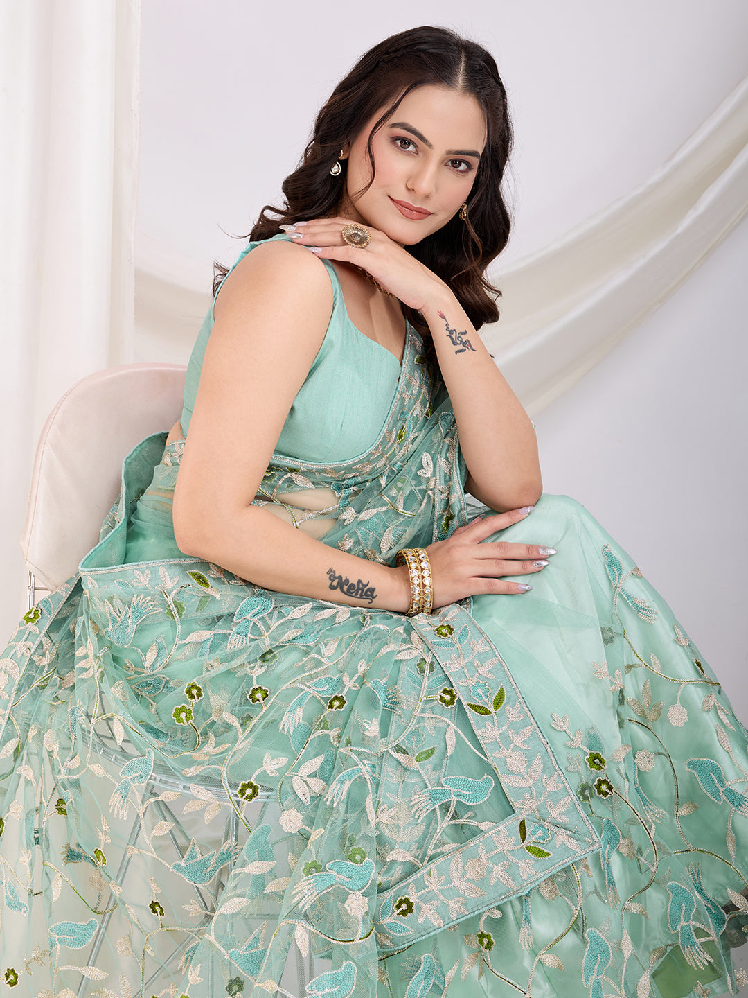 Incredible Sea Green Thread Embroidery Net Designer Saree With Blouse