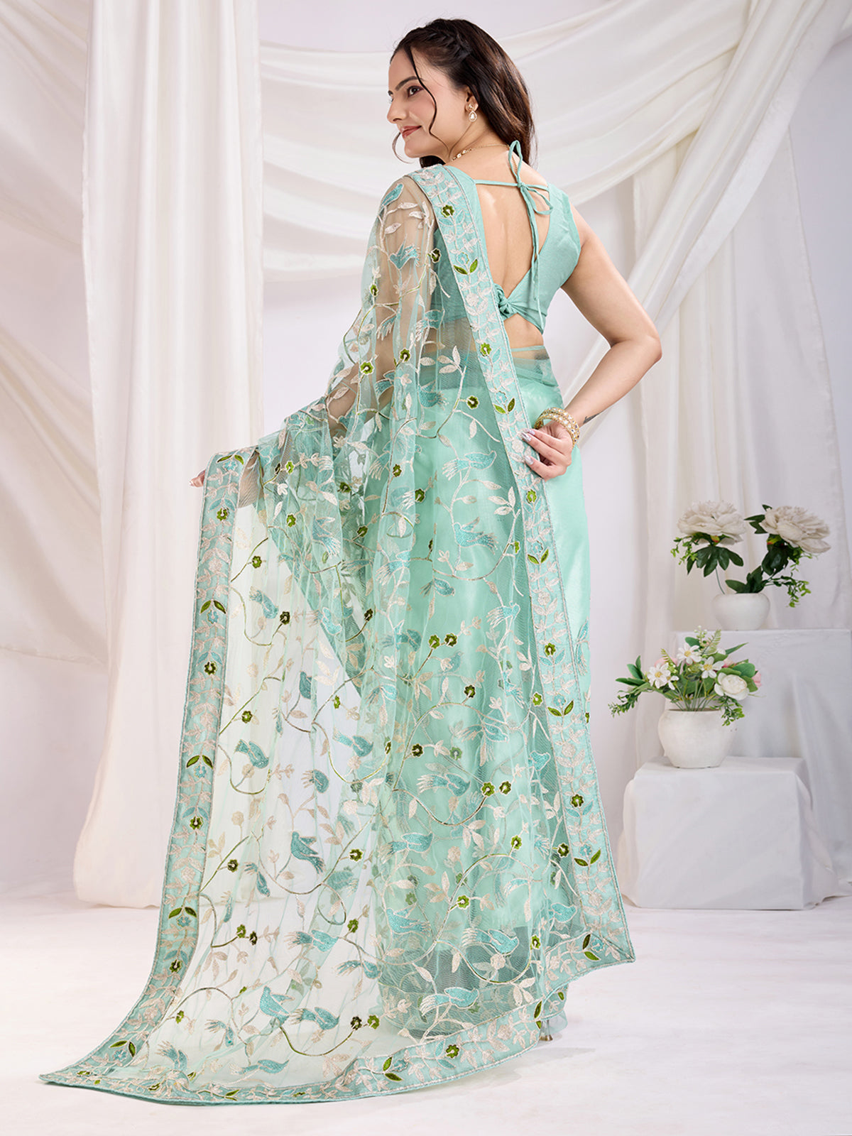 Incredible Sea Green Thread Embroidery Net Designer Saree With Blouse