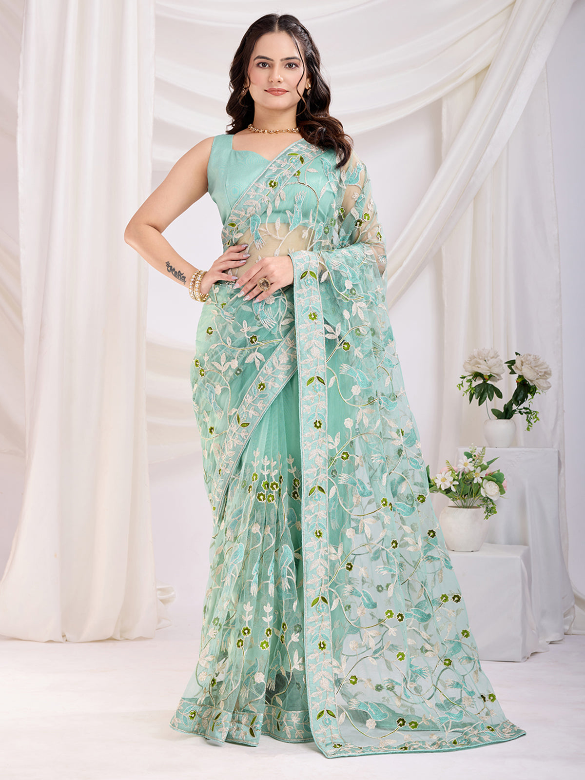 Incredible Sea Green Thread Embroidery Net Designer Saree With Blouse