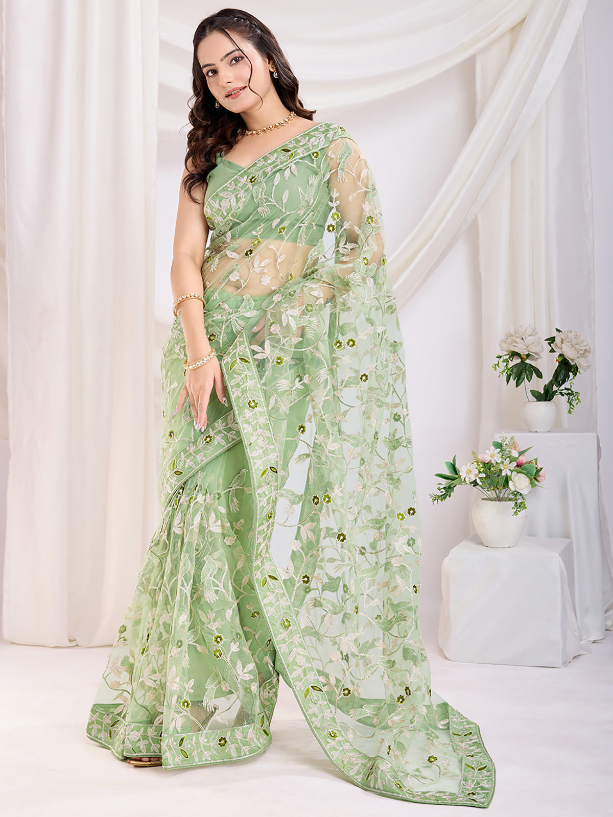 Spectacular Pista Green Thread Embroidery Net Festive Wear Saree