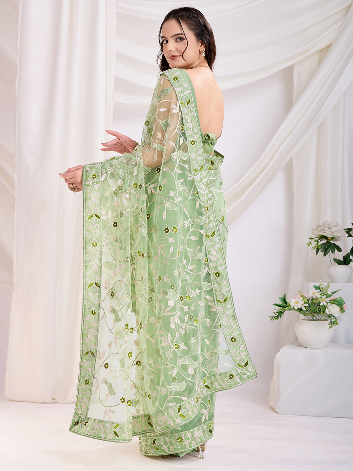 Spectacular Pista Green Thread Embroidery Net Festive Wear Saree