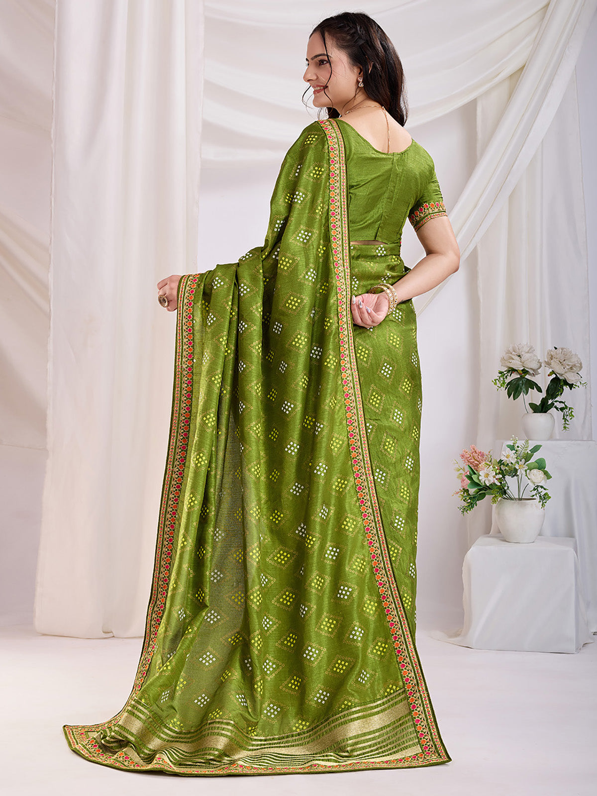 Precious Green Bandhej Printed Silk Mehendi Wear Saree