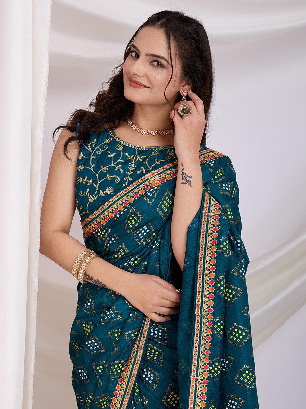 Alluring Teal Blue Bandhej Printed Silk Festive Wear Saree