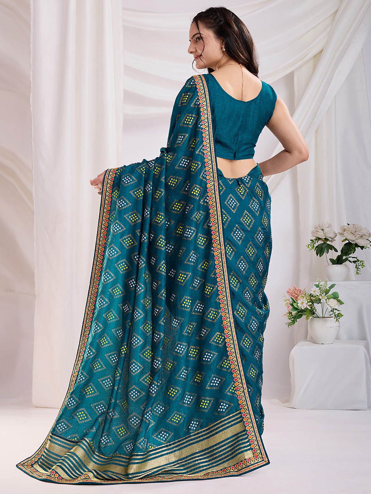 Alluring Teal Blue Bandhej Printed Silk Festive Wear Saree