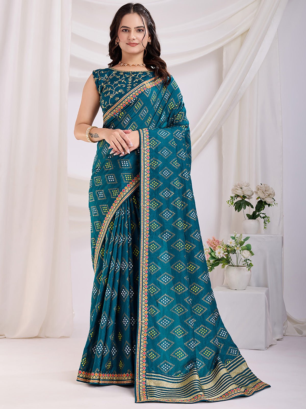 Alluring Teal Blue Bandhej Printed Silk Festive Wear Saree