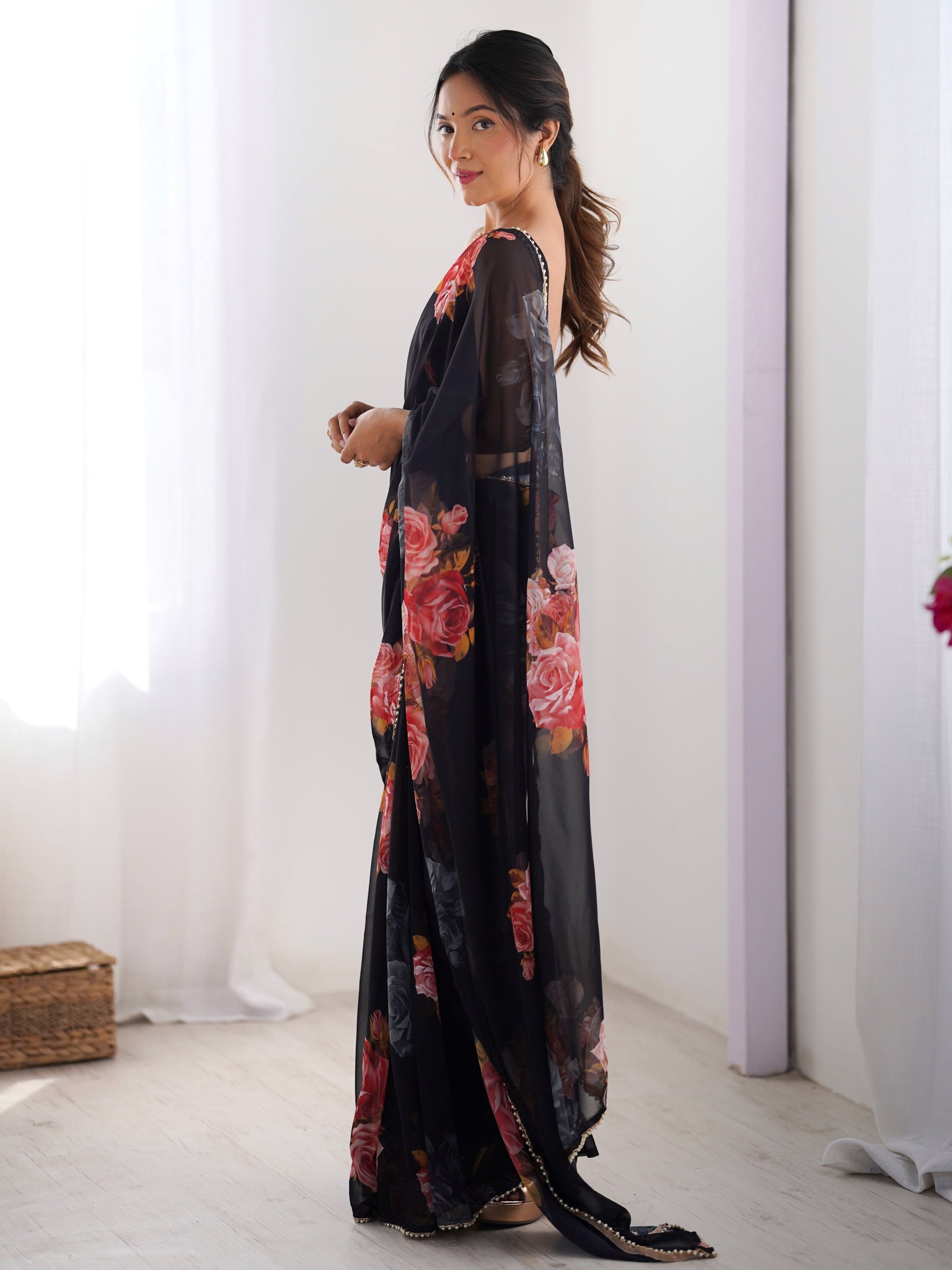 Dazzling Black Floral Printed Georgette Party Wear Saree With Blouse