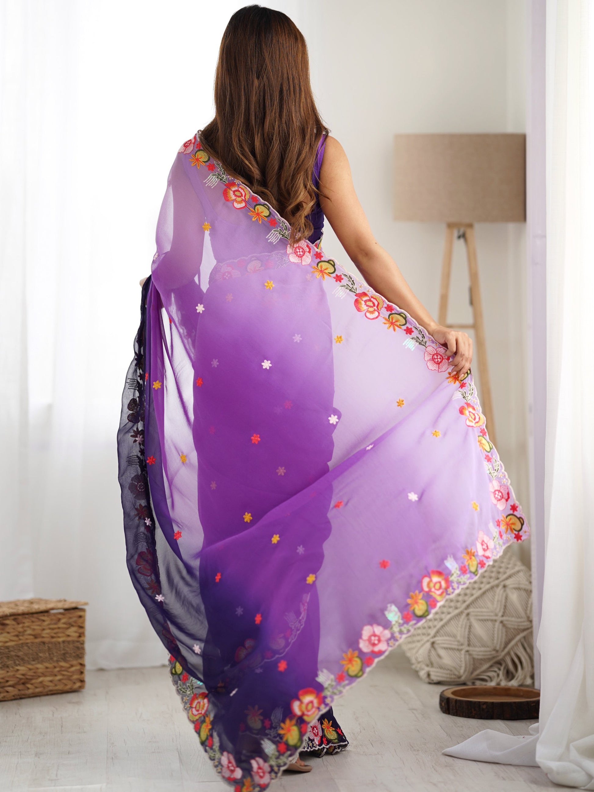 Amazing Purple Thread Embroidered Georgette Casual Wear Saree