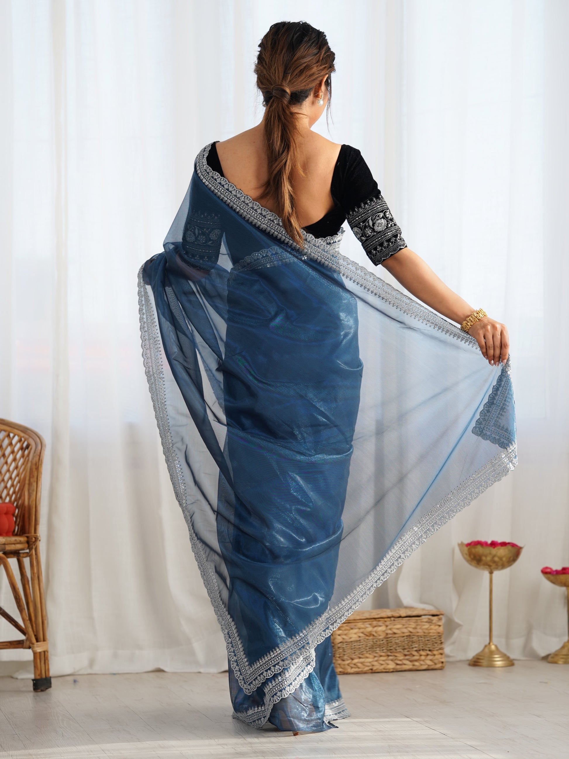 Ravishing Teal Blue Border Work Net Reception Wear Saree With Blouse