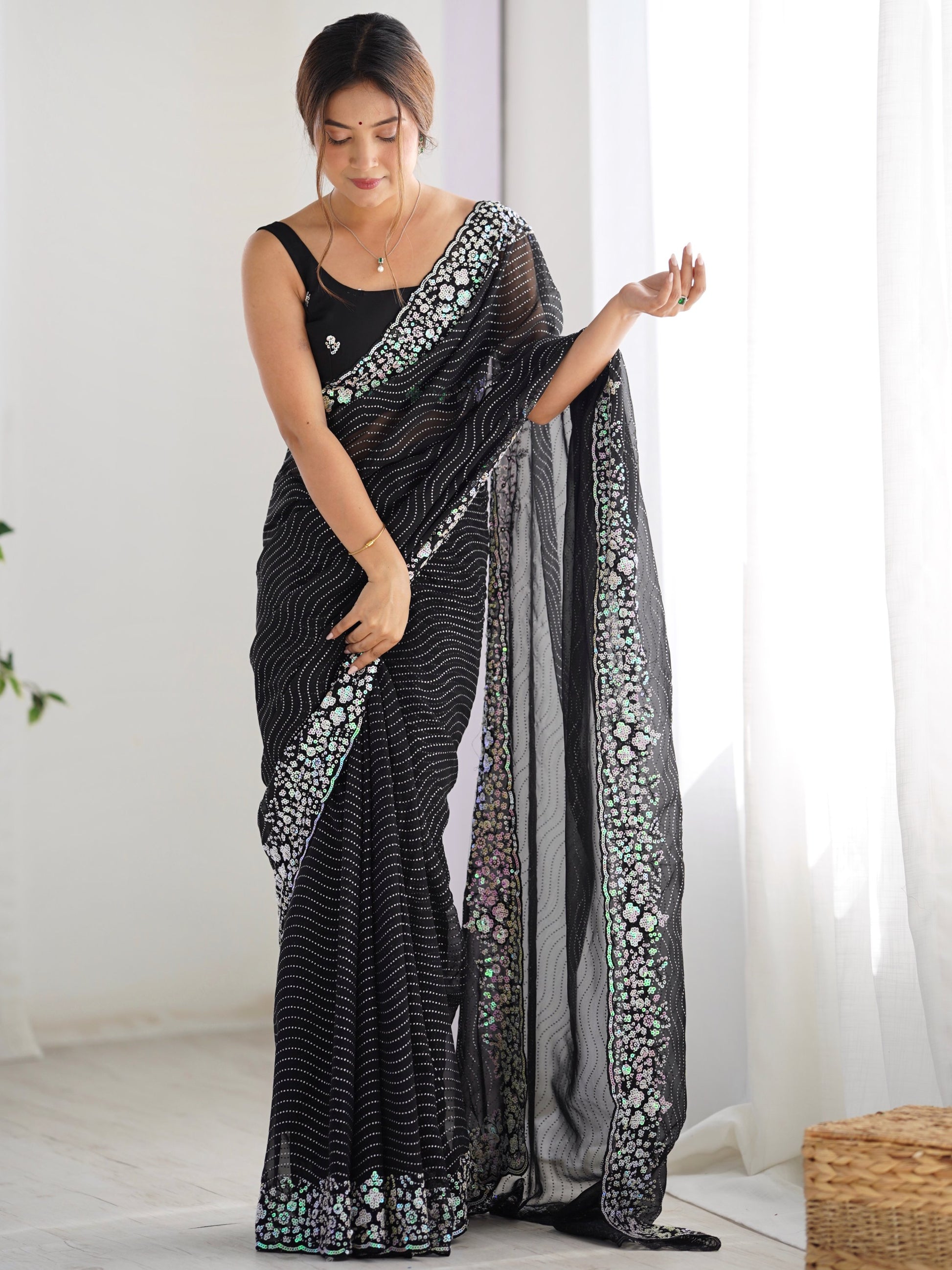 Eye-Catching Black Sequins Georgette Party Wear Saree With Blouse