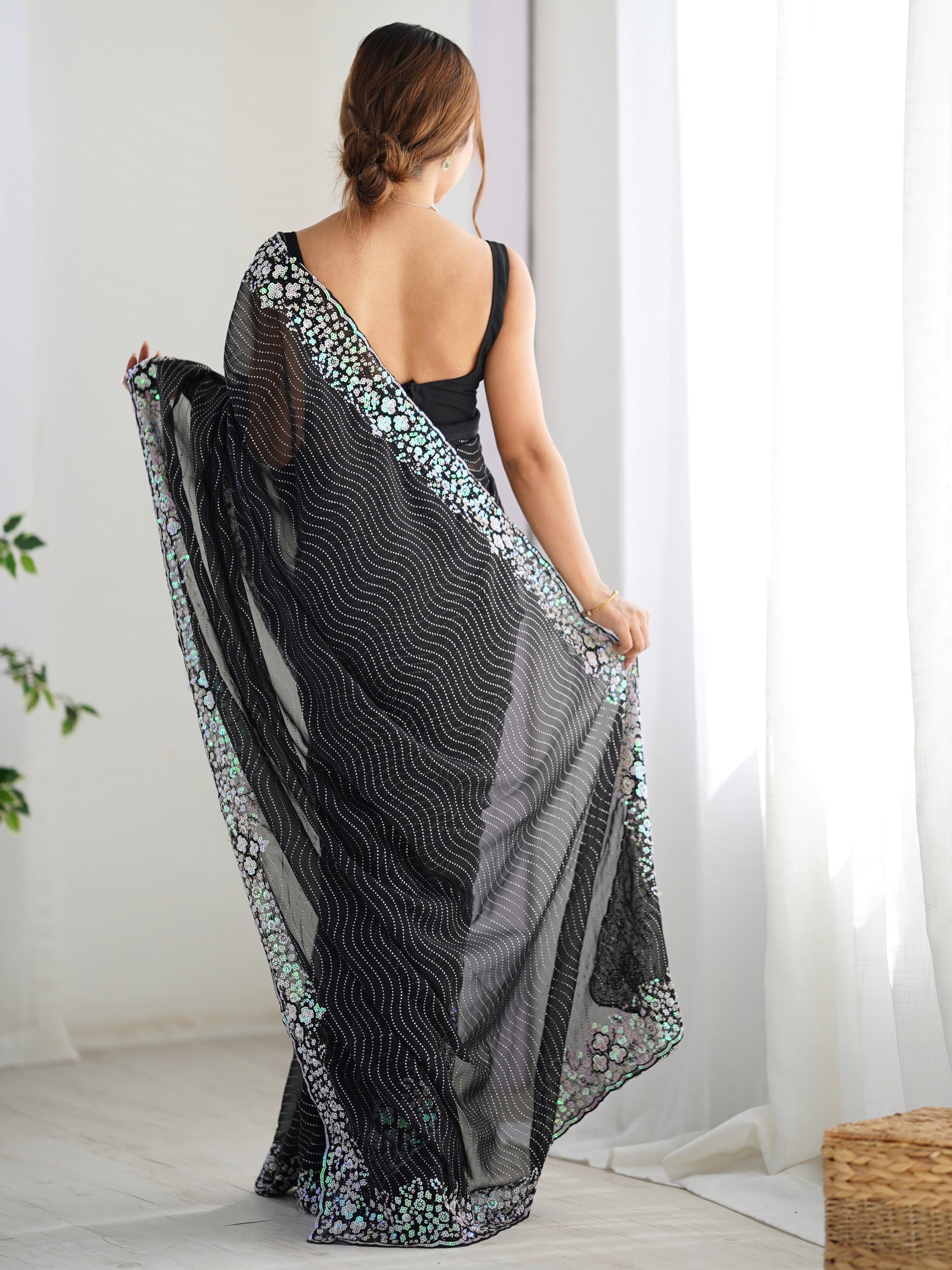 Eye-Catching Black Sequins Georgette Party Wear Saree With Blouse