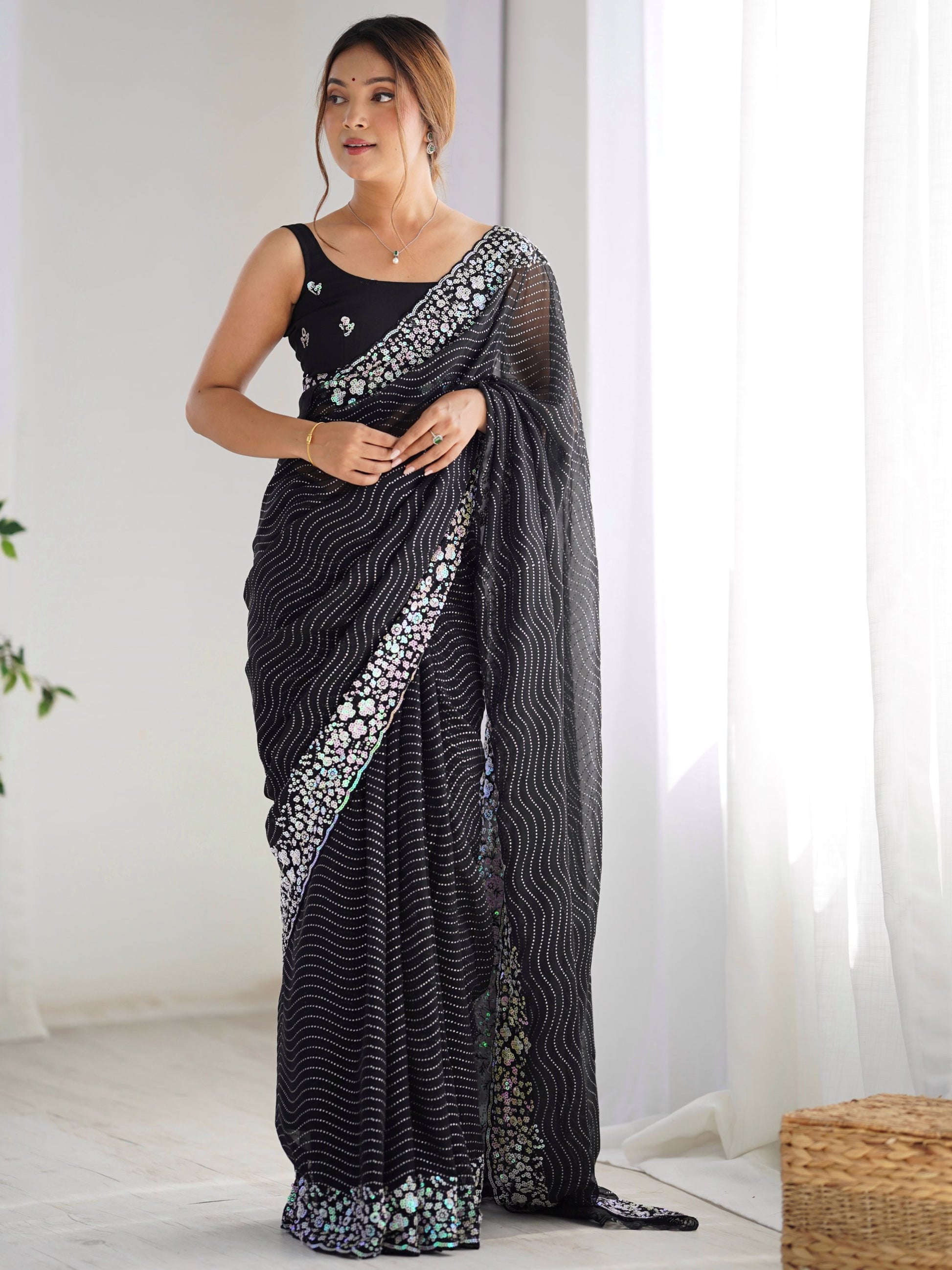 Eye-Catching Black Sequins Georgette Party Wear Saree With Blouse