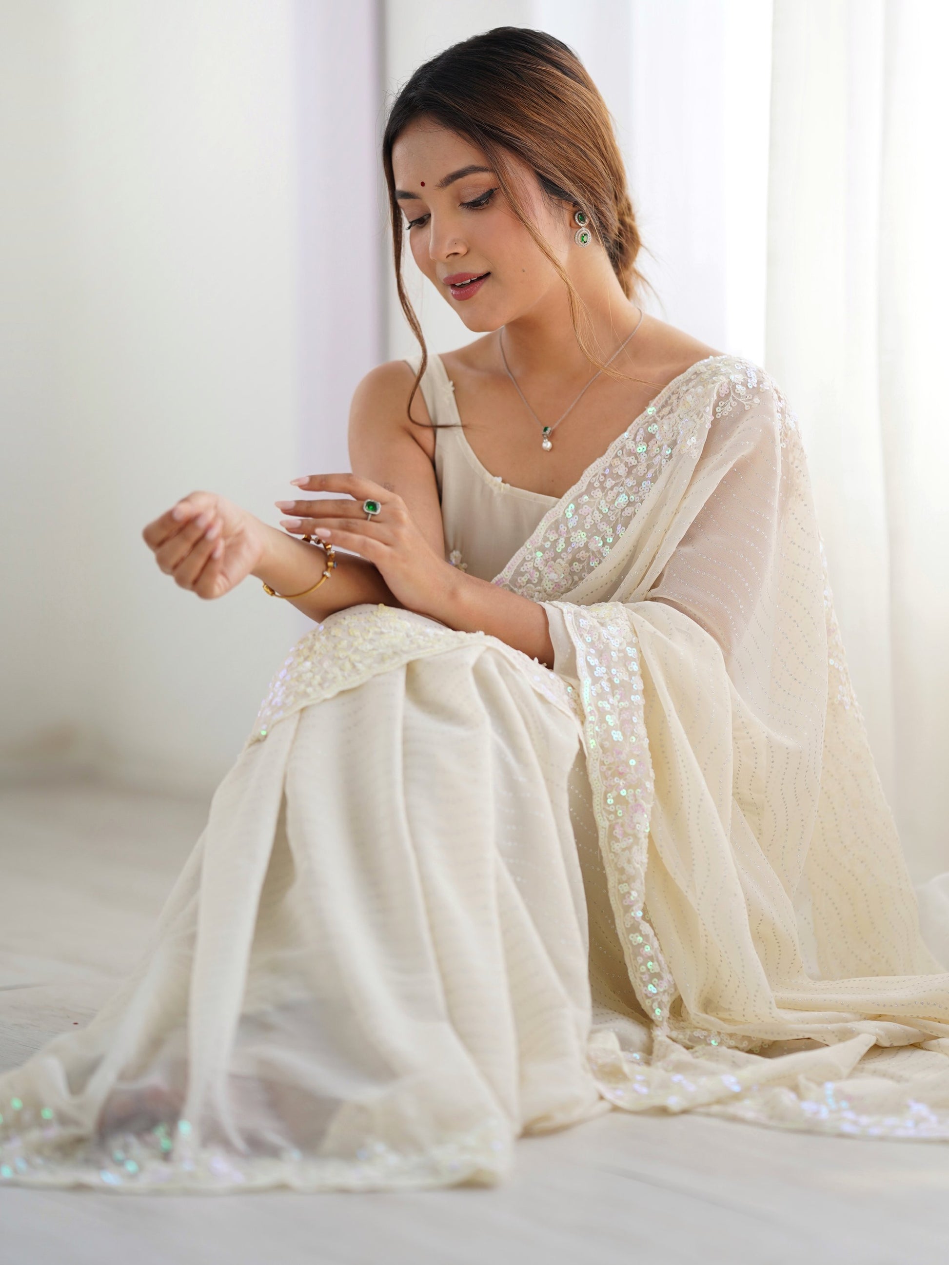 Fascinating Cream Sequins Georgette Event Wear Saree With Blouse