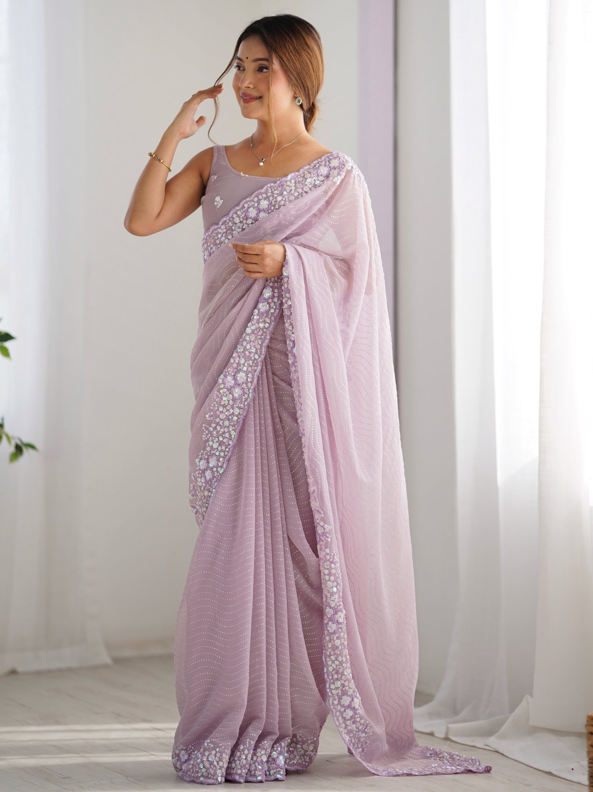 Fantabulous Lavender Embroidered Georgette Wedding Wear Saree