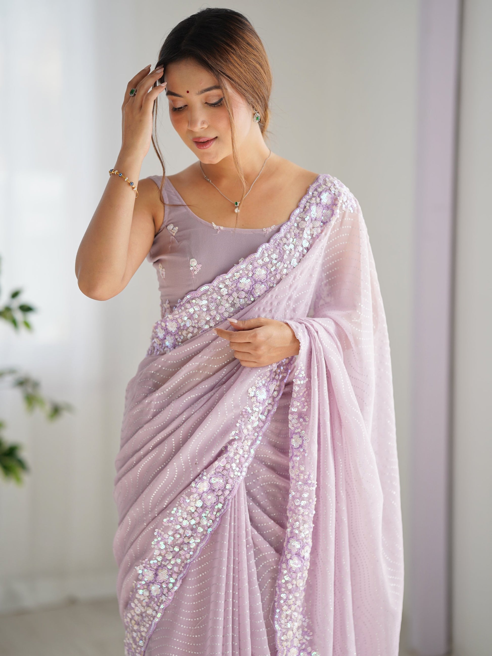 Fantabulous Lavender Embroidered Georgette Wedding Wear Saree