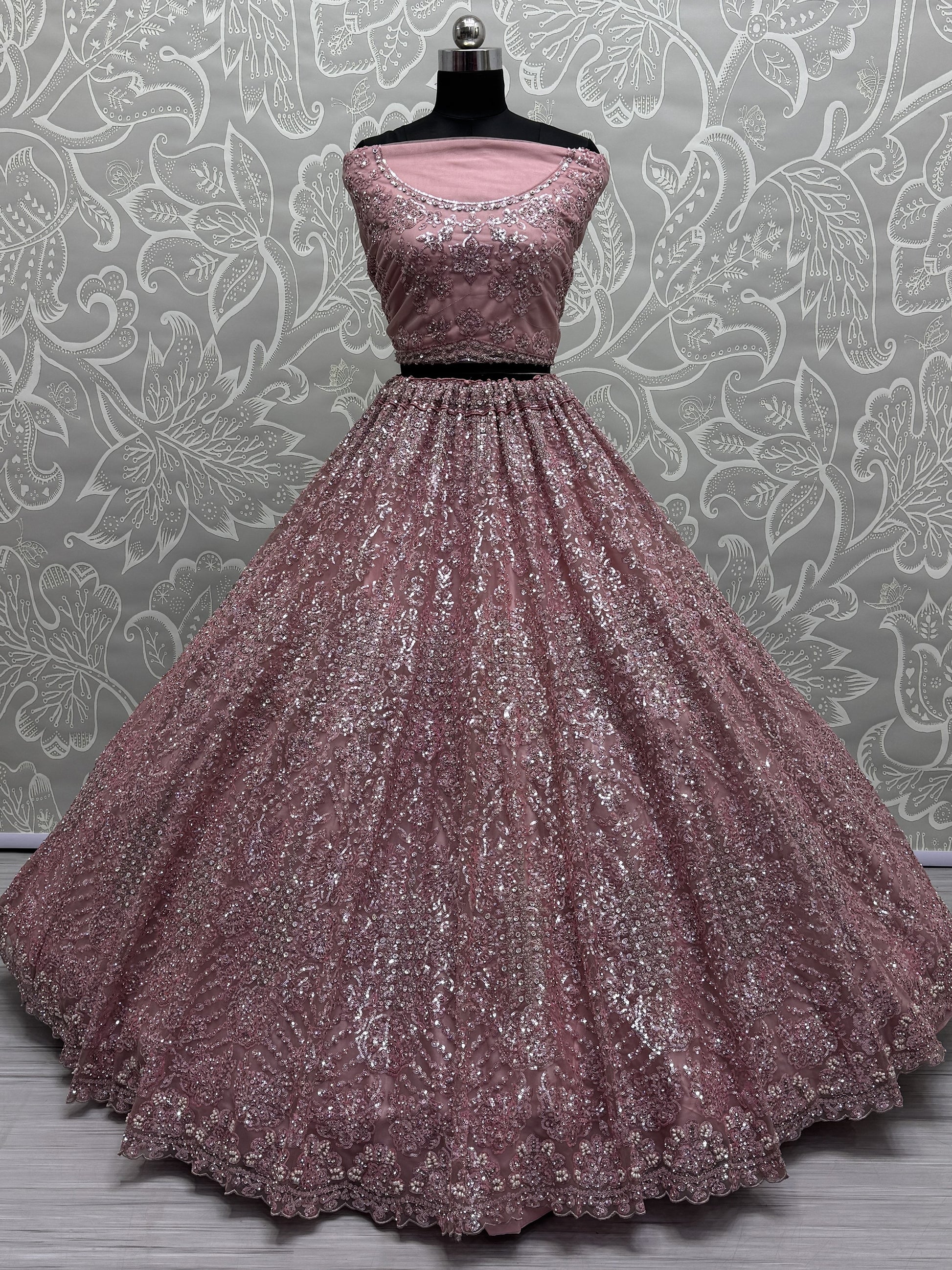 Beautiful Pink Sequins Heavy Net Engagement Wear Lehenga Choli