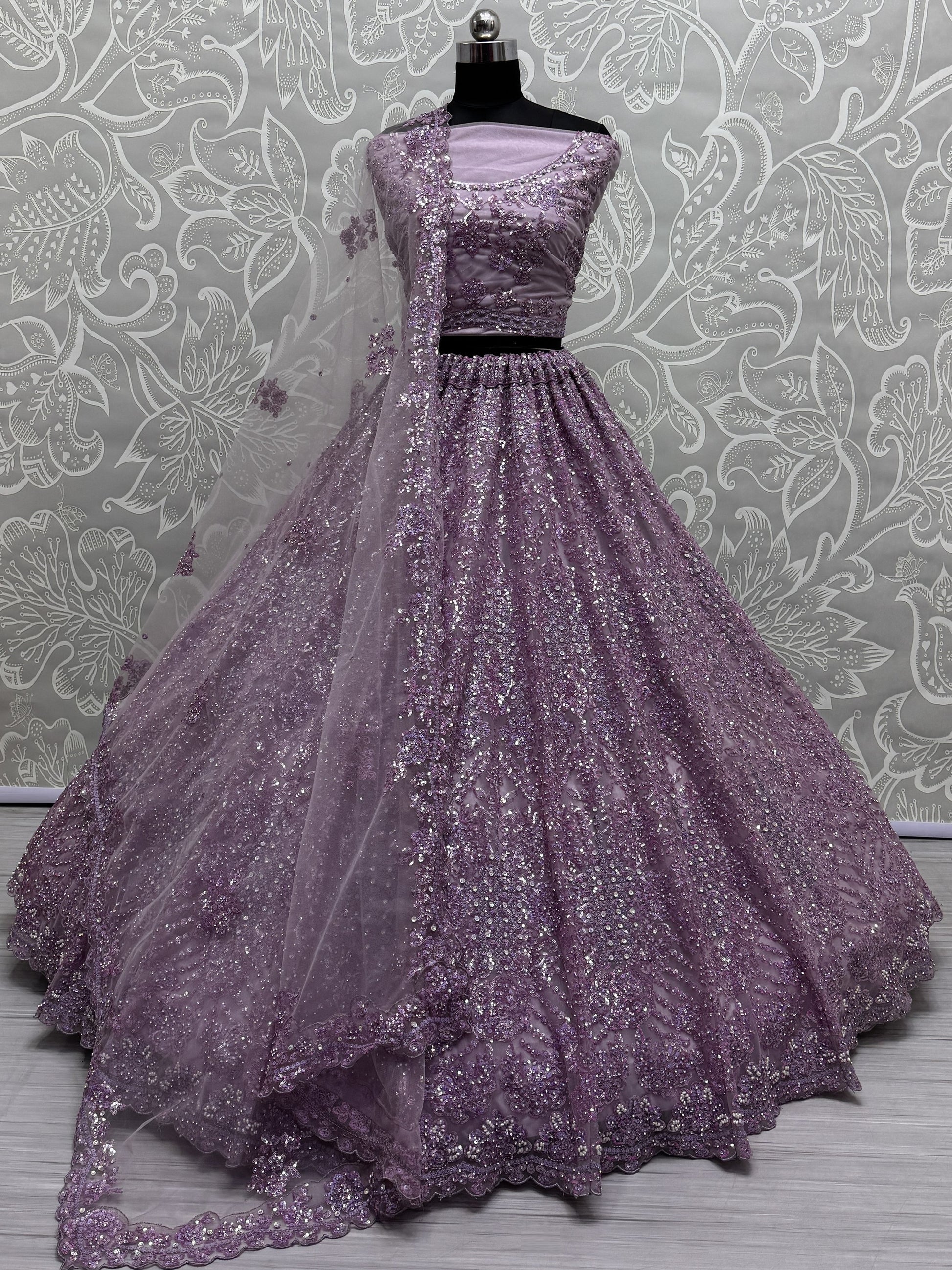 Amazing Purple Sequins Heavy Net Wedding Wear Lehenga Choli