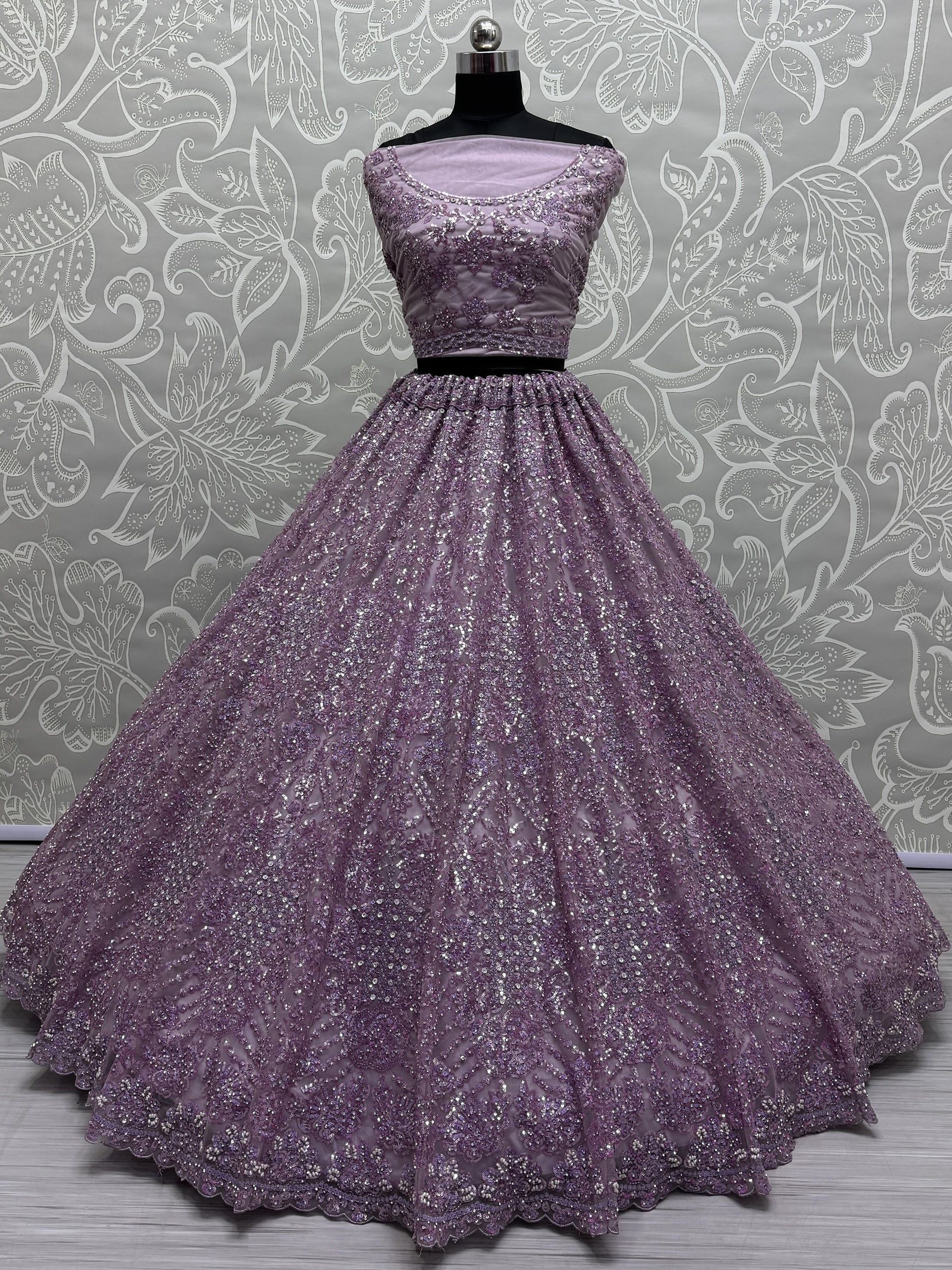 Amazing Purple Sequins Heavy Net Wedding Wear Lehenga Choli