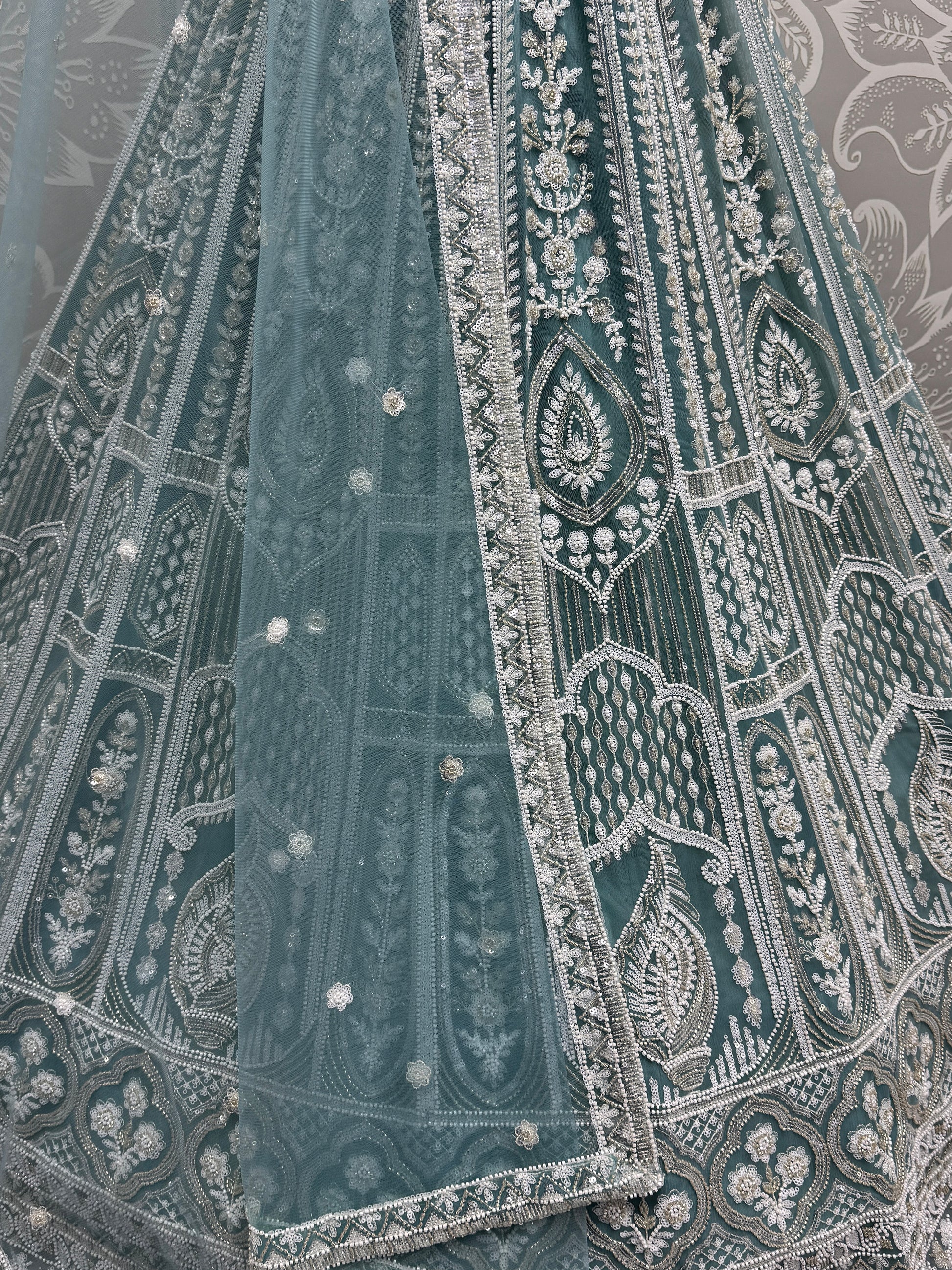 Enchanting Sky-Blue Sequins Net Reception Wear Lehenga Choli