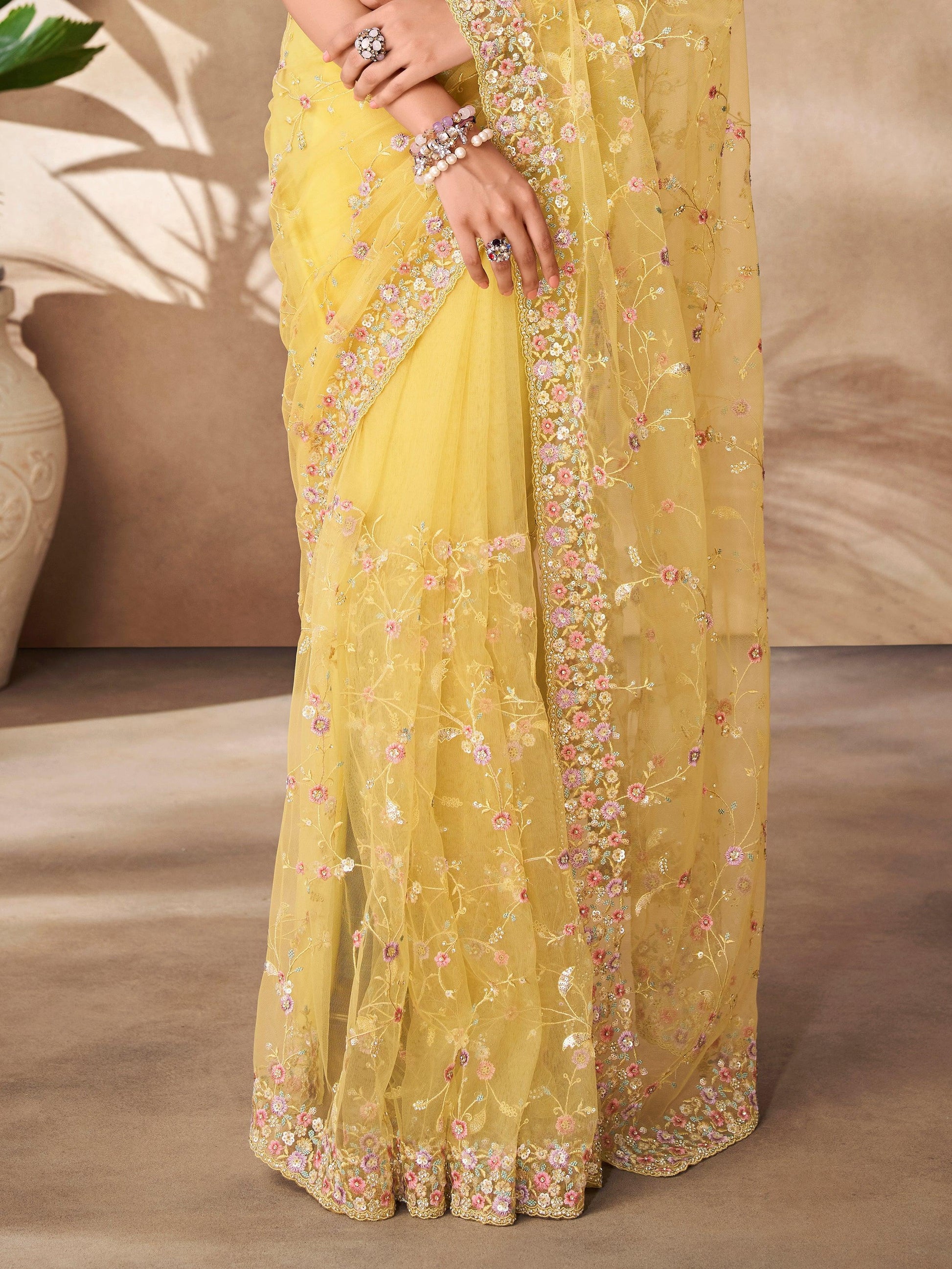 Fascinating Yellow Sequins Net Designer Saree With Blouse