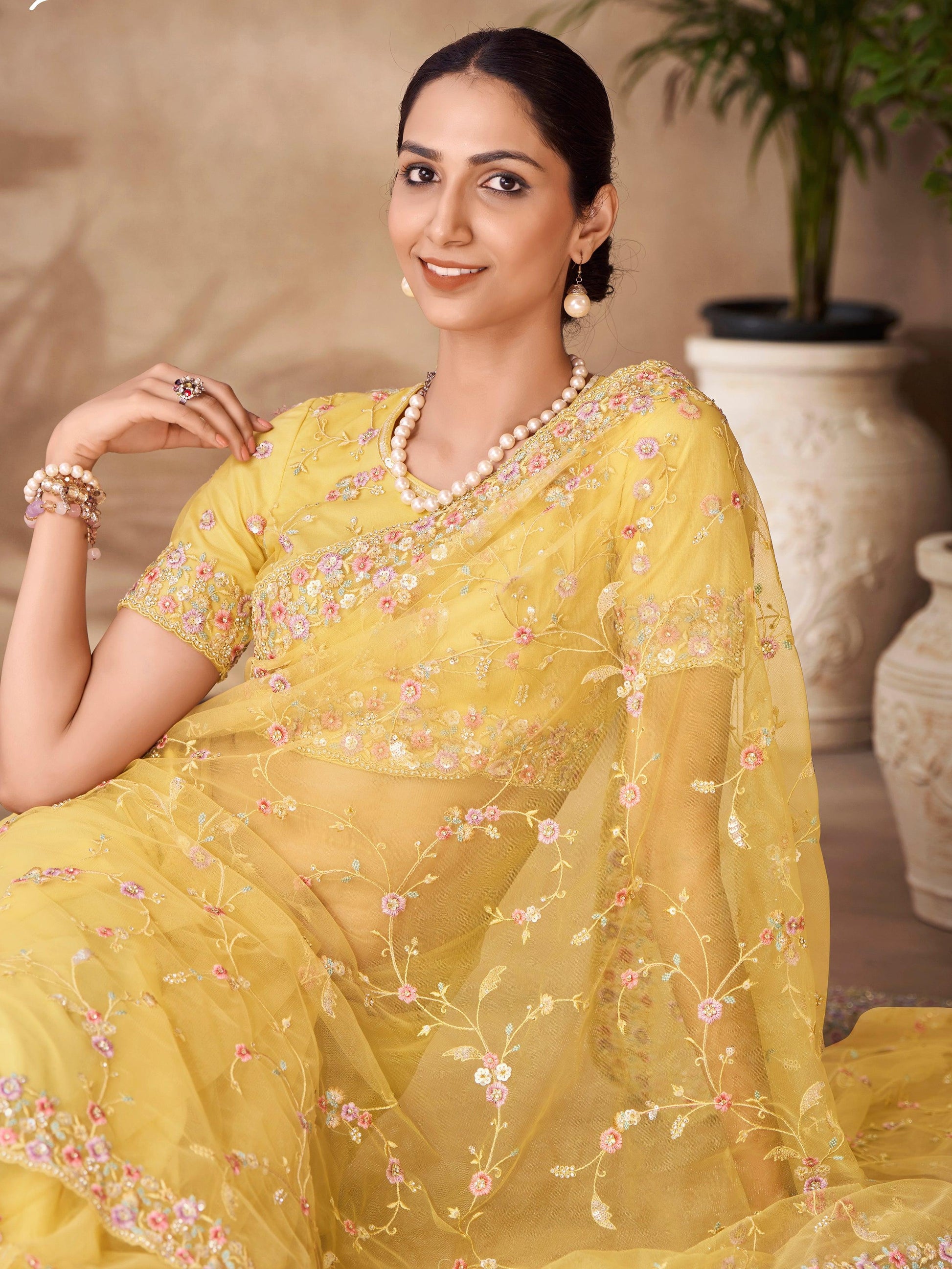 Fascinating Yellow Sequins Net Designer Saree With Blouse