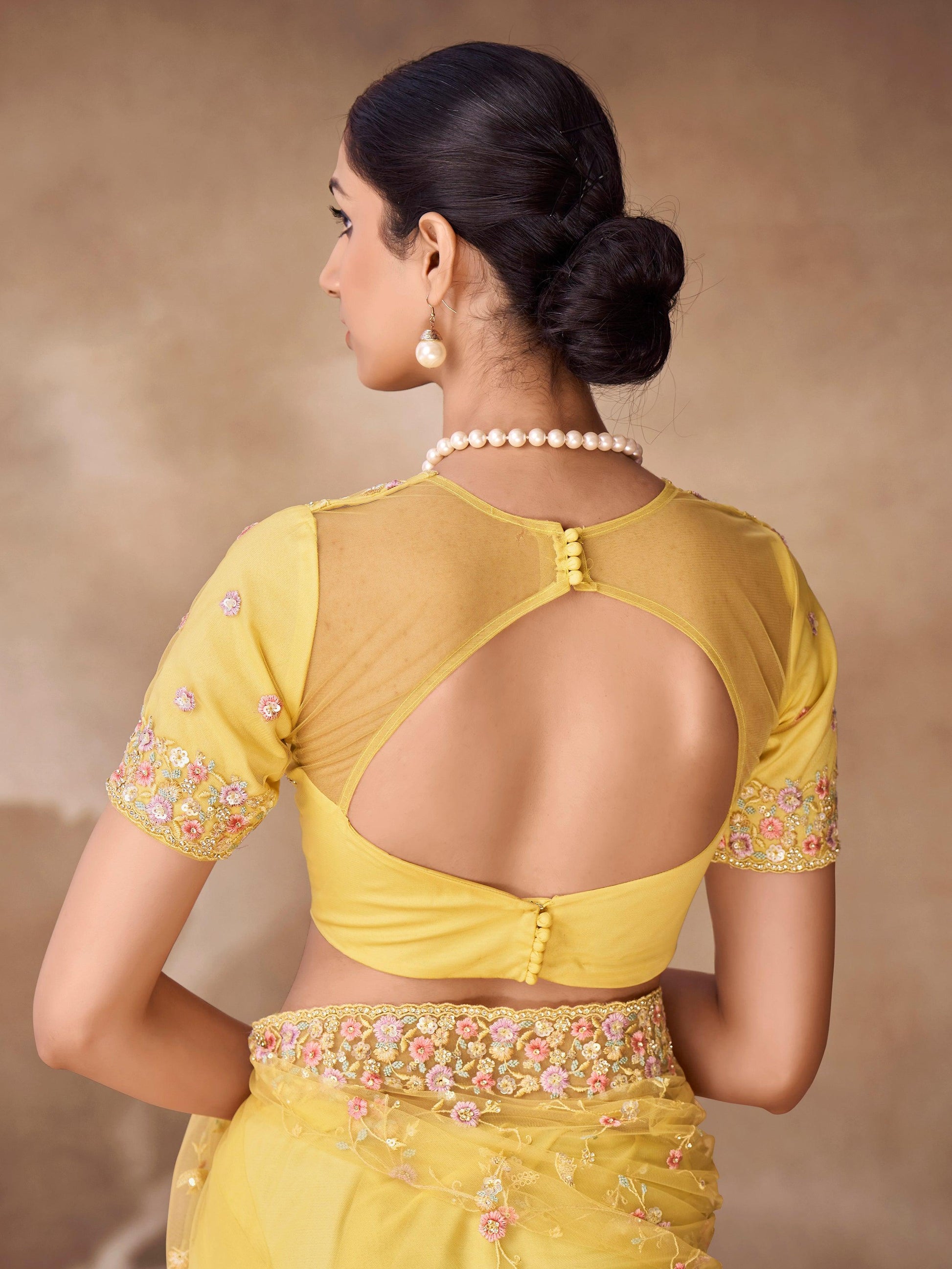 Fascinating Yellow Sequins Net Designer Saree With Blouse