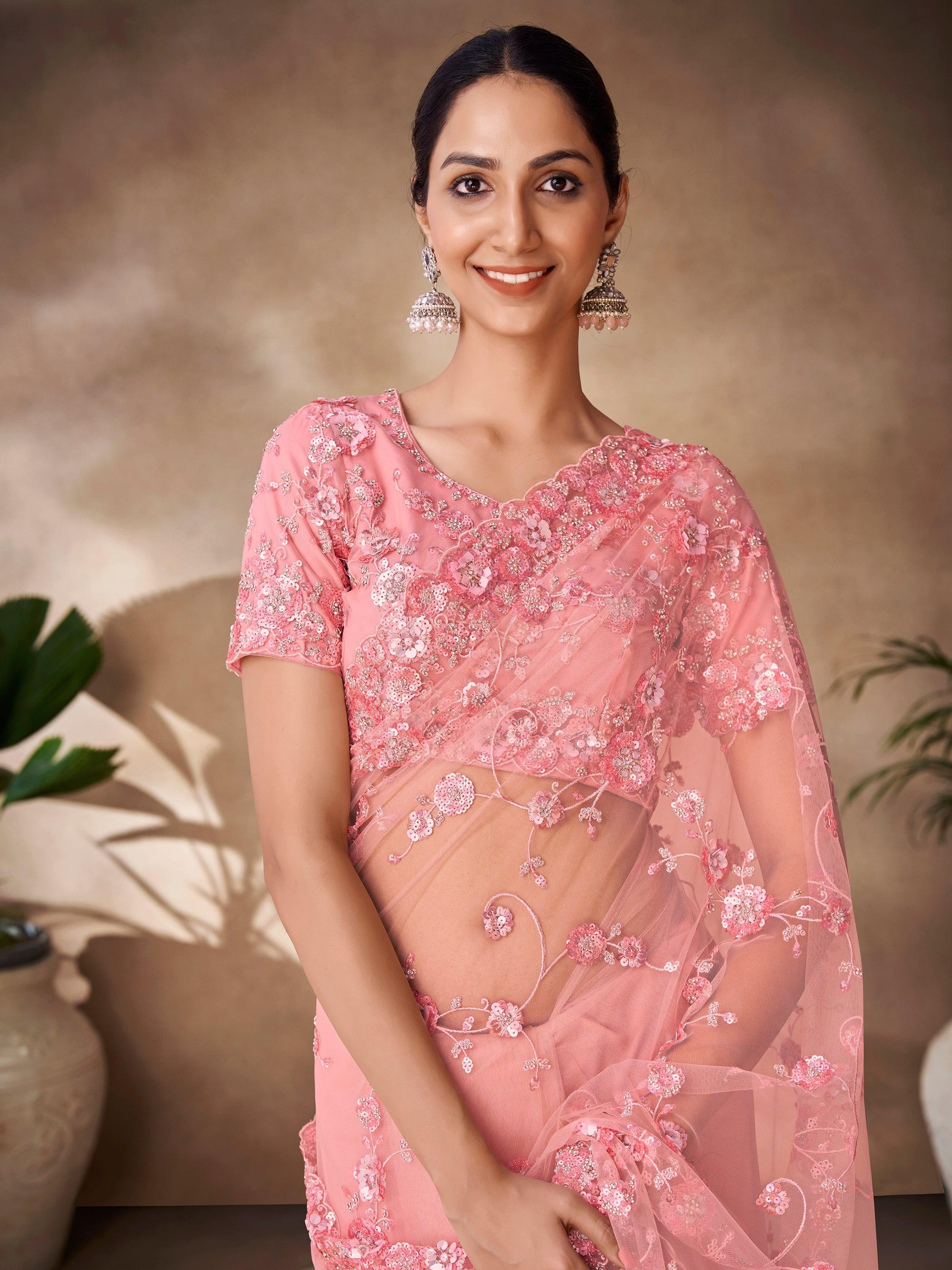 Mesmerizing Peach Sequins Net Reception Wear Saree With Blouse