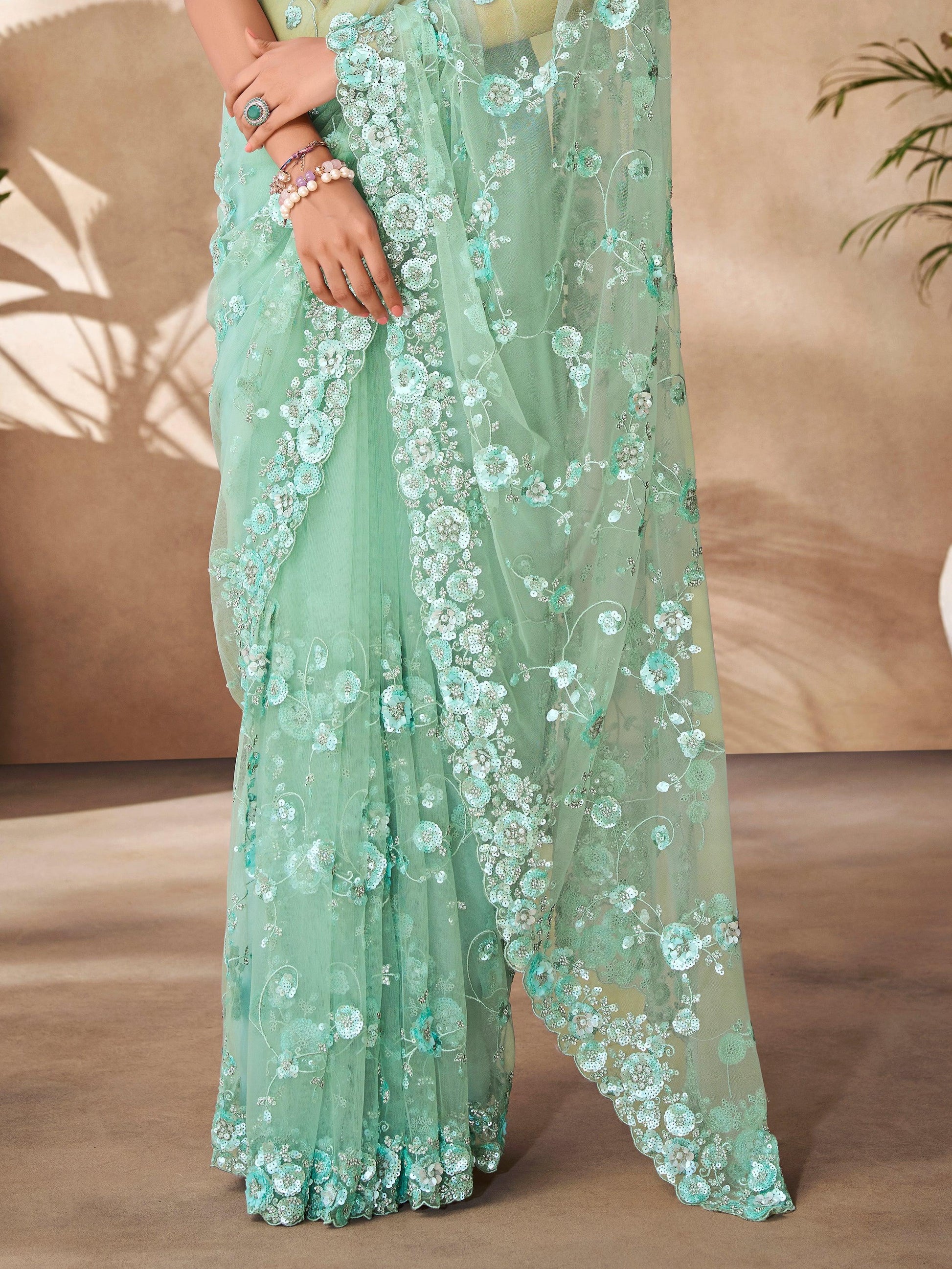 Bewitching Mint Green Sequins Net Designer Saree With Blouse