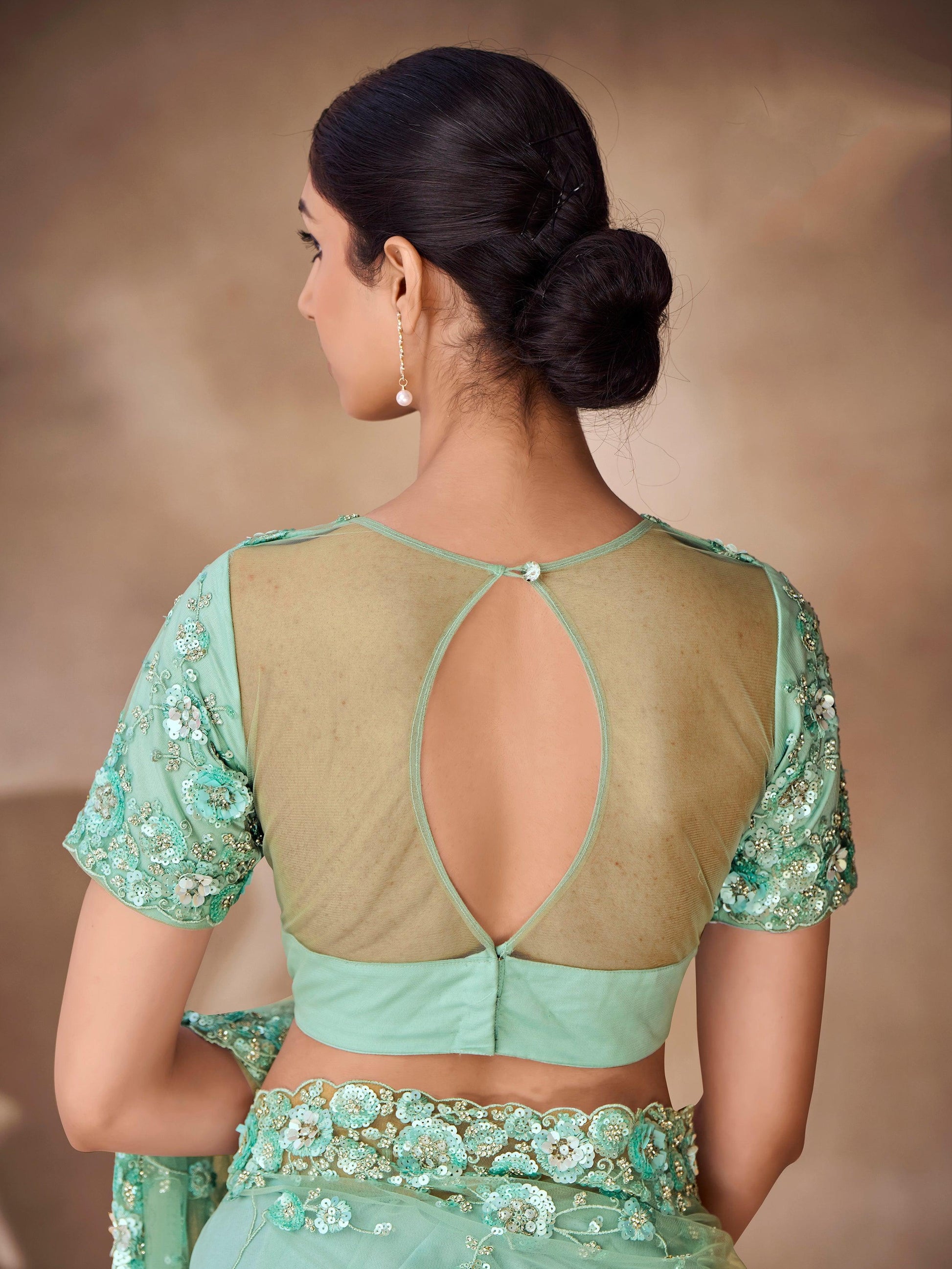 Bewitching Mint Green Sequins Net Designer Saree With Blouse