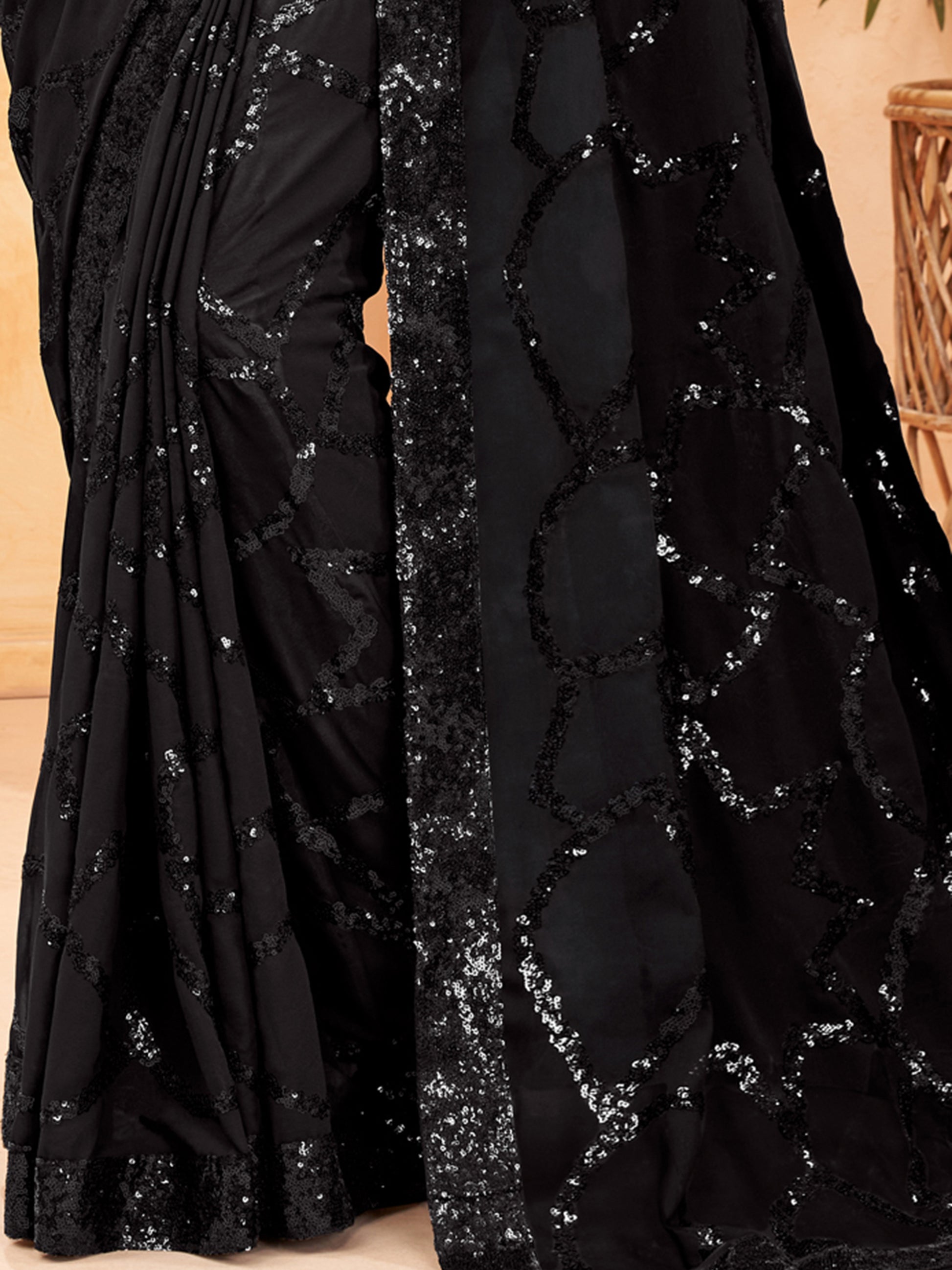 Astonishing Black Sequins Georgette Reception Wear Saree