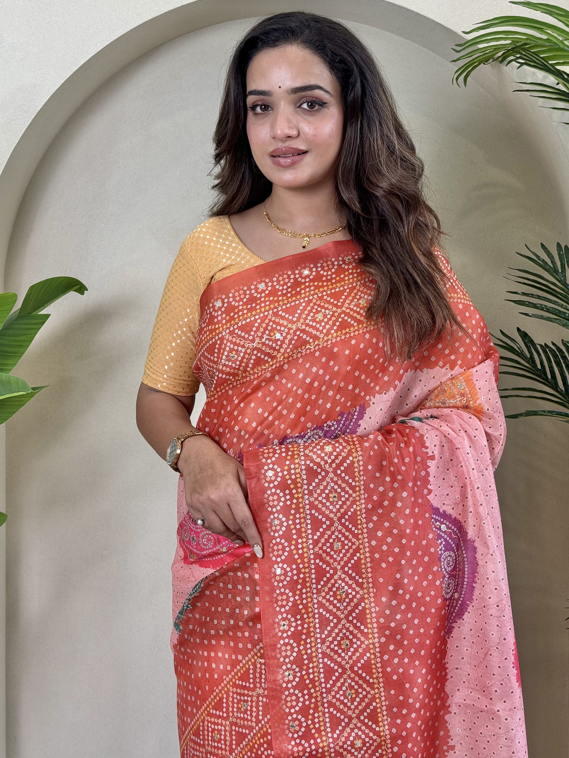 Stunning Peach Bandhni Printed Tissue Silk Saree With Yellow Blouse