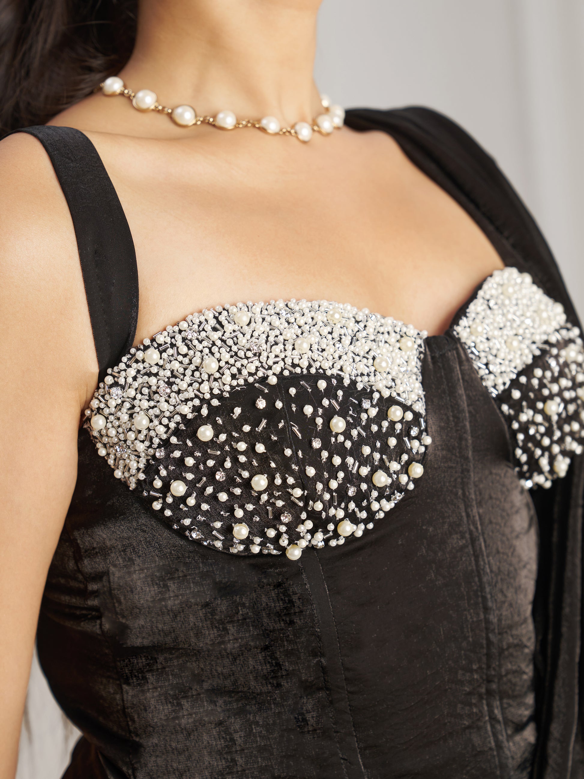Dazzling Black Organza Pre-Stitched Saree With Corset Blouse