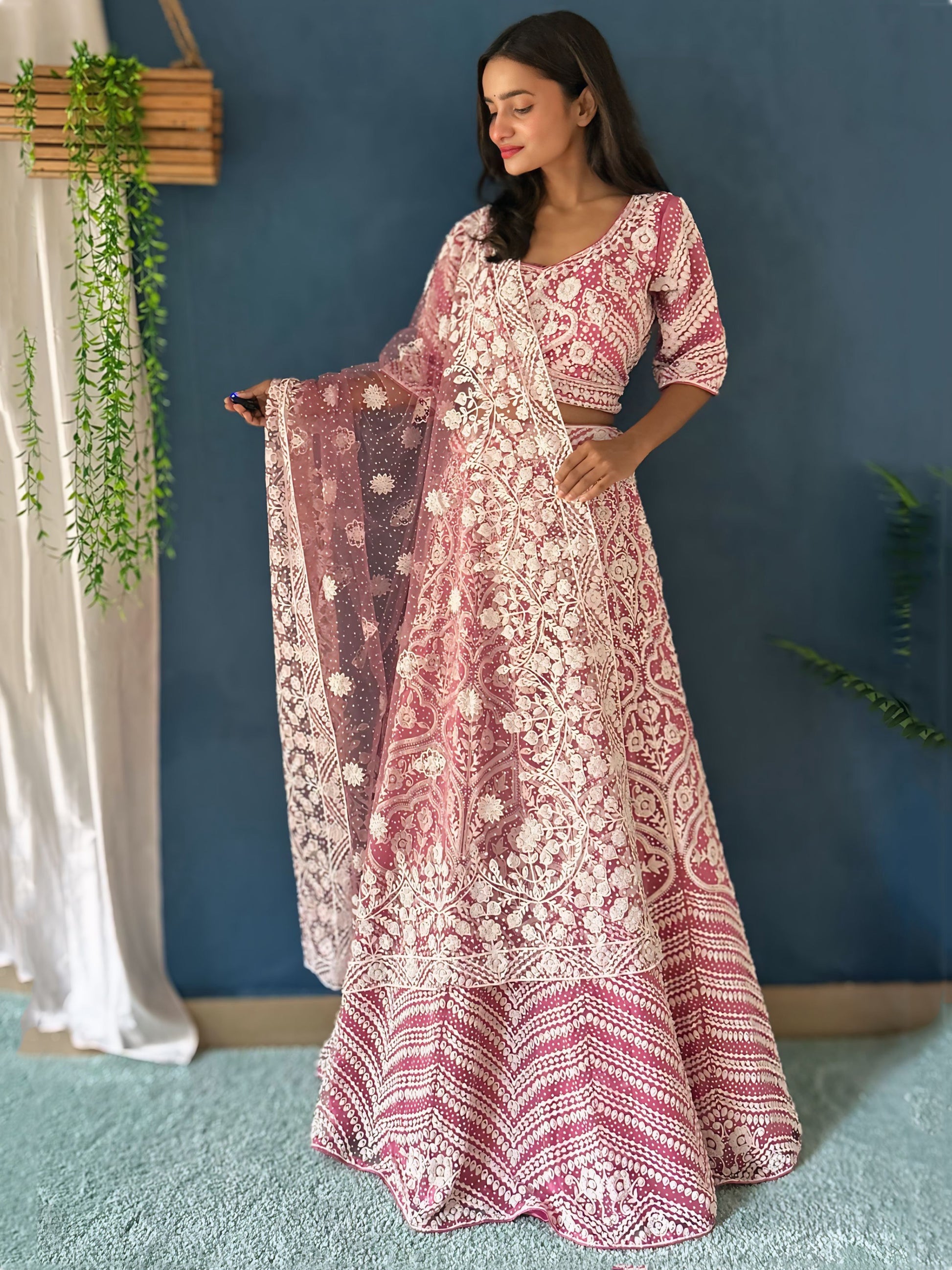 Mesmerizing Pink Beads Work Net Engagement Wear Lehenga Choli