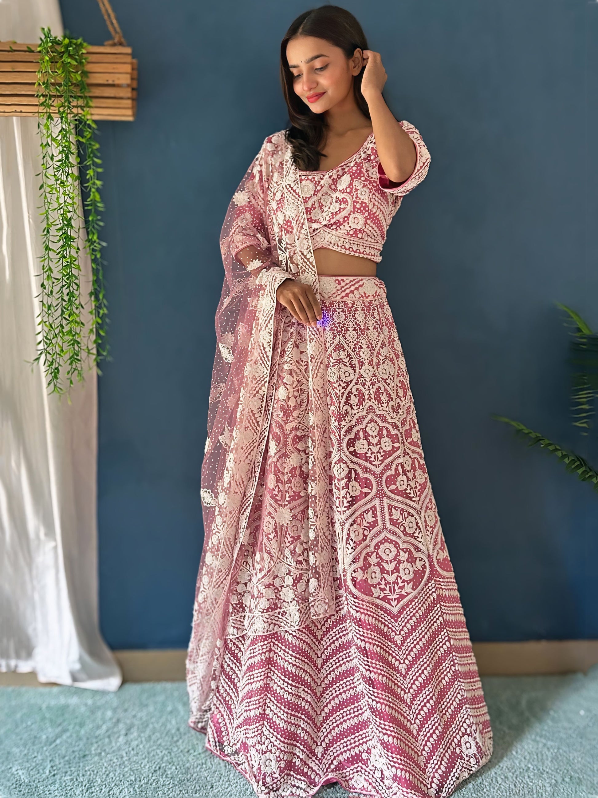 Mesmerizing Pink Beads Work Net Engagement Wear Lehenga Choli