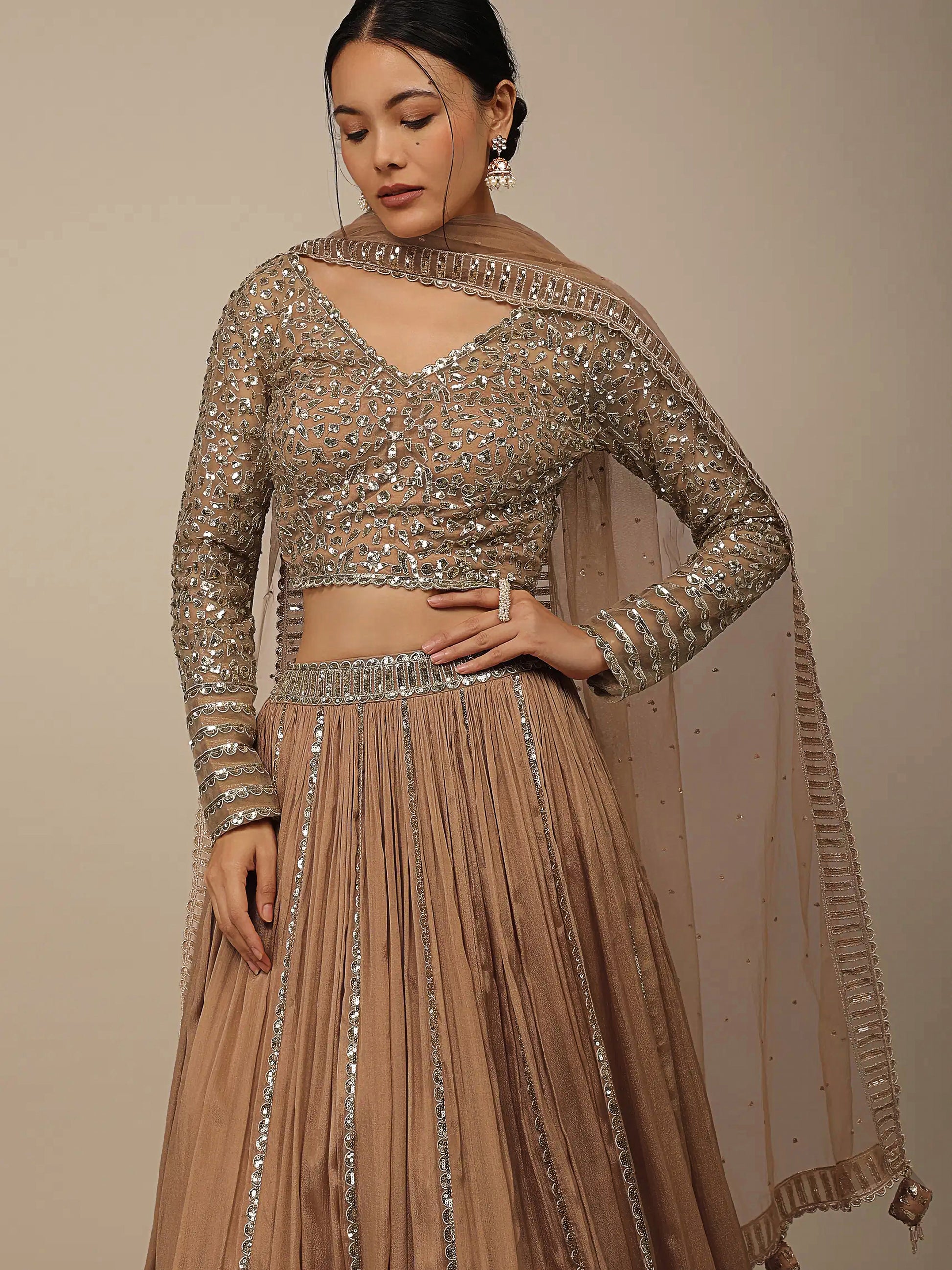 Enchanting Beige Sequins Georgette Engagement Wear Lehenga Choli