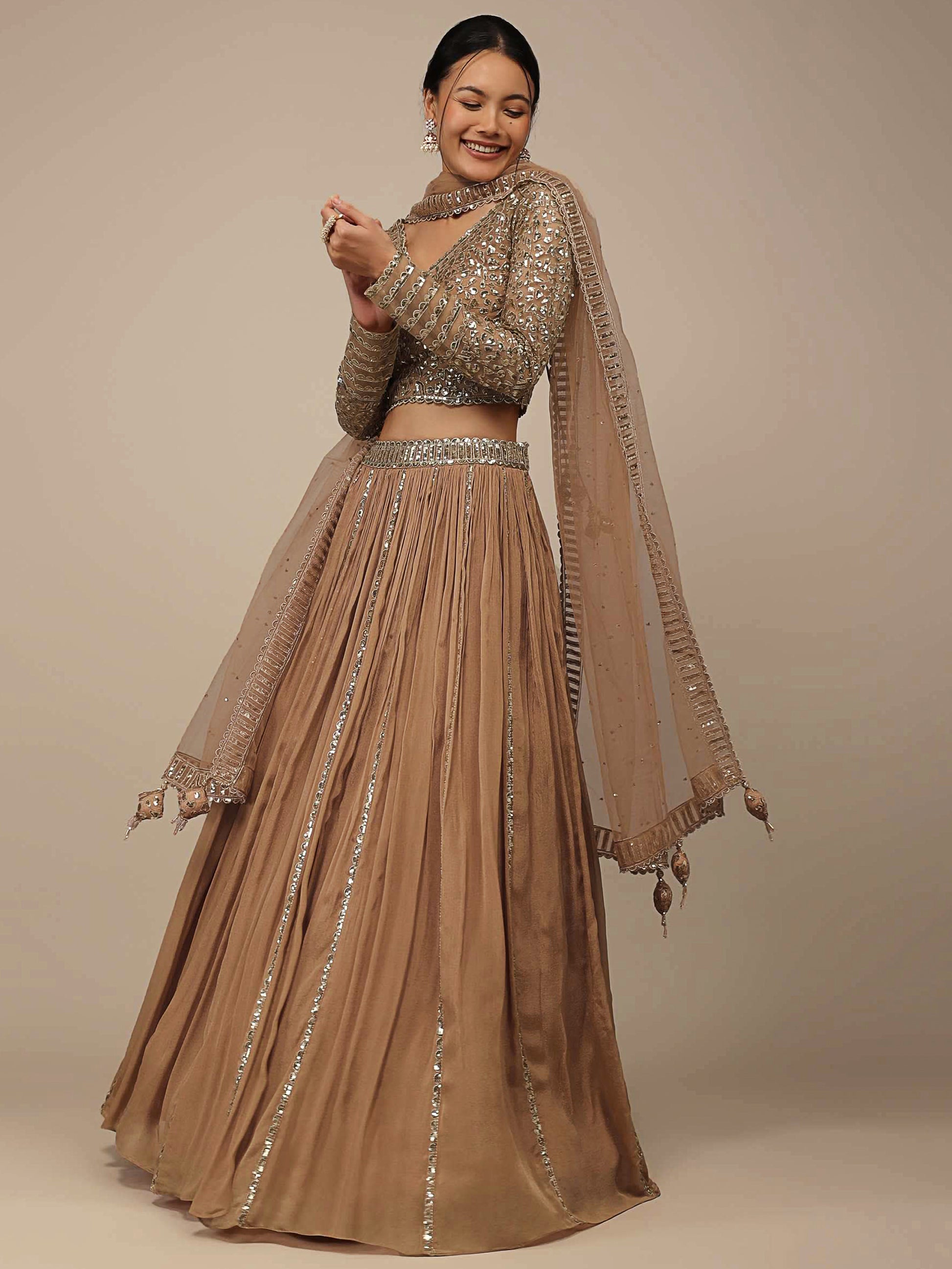 Enchanting Beige Sequins Georgette Engagement Wear Lehenga Choli