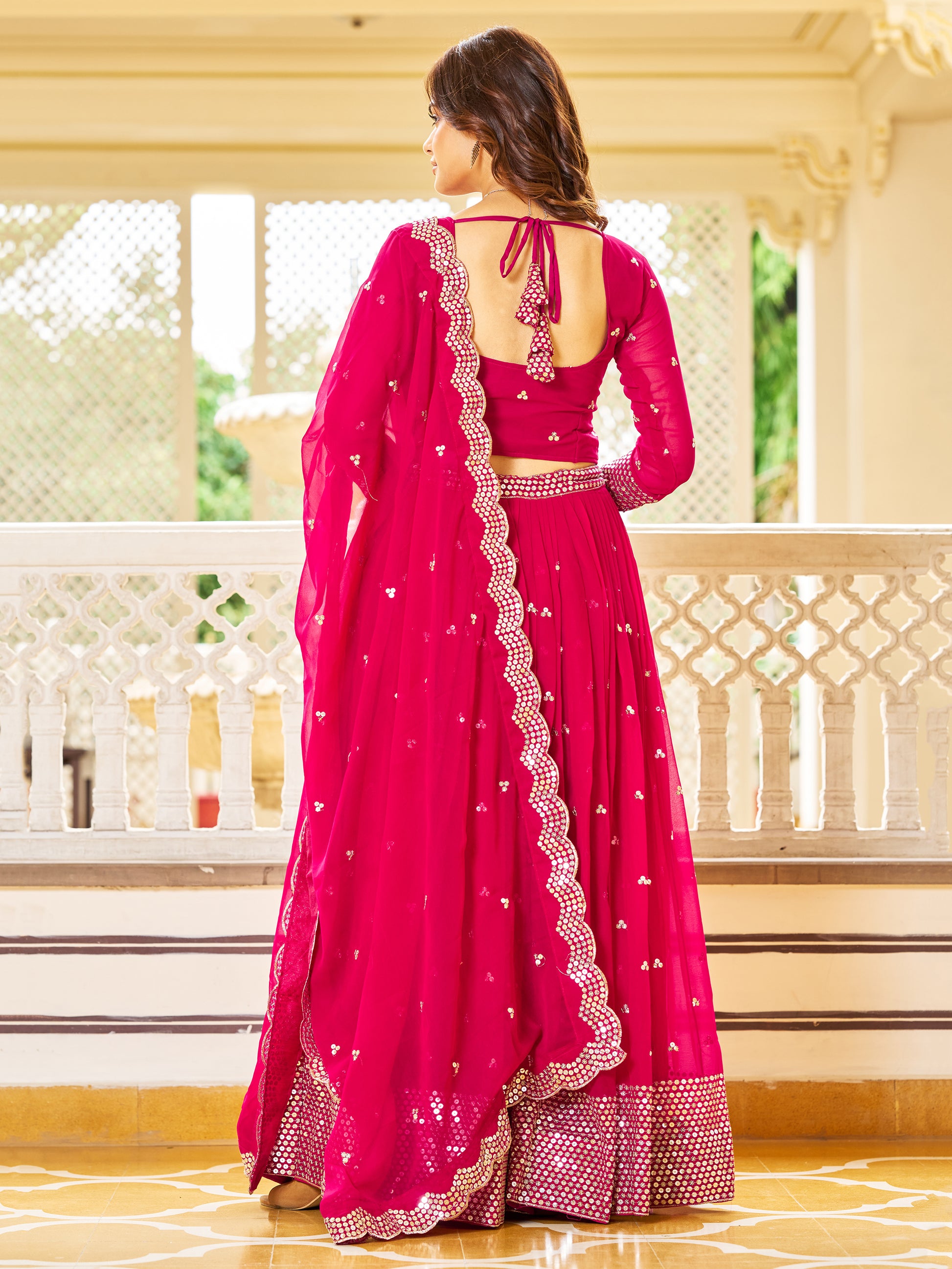 Alluring Pink Sequins Georgette Engagement Wear Lehenga Choli