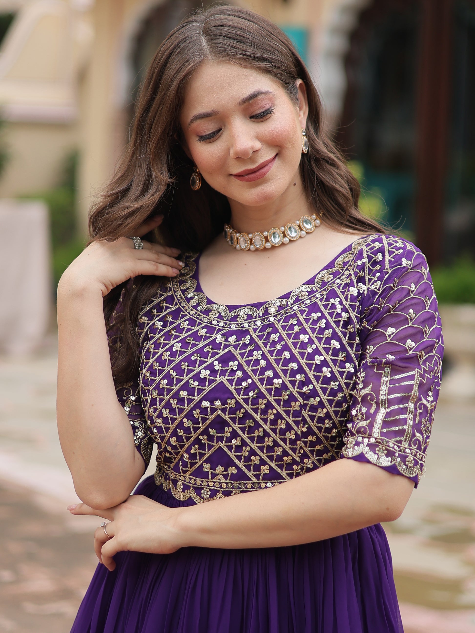 Fabulous Purple Embroidered Georgette Reception Wear Gown