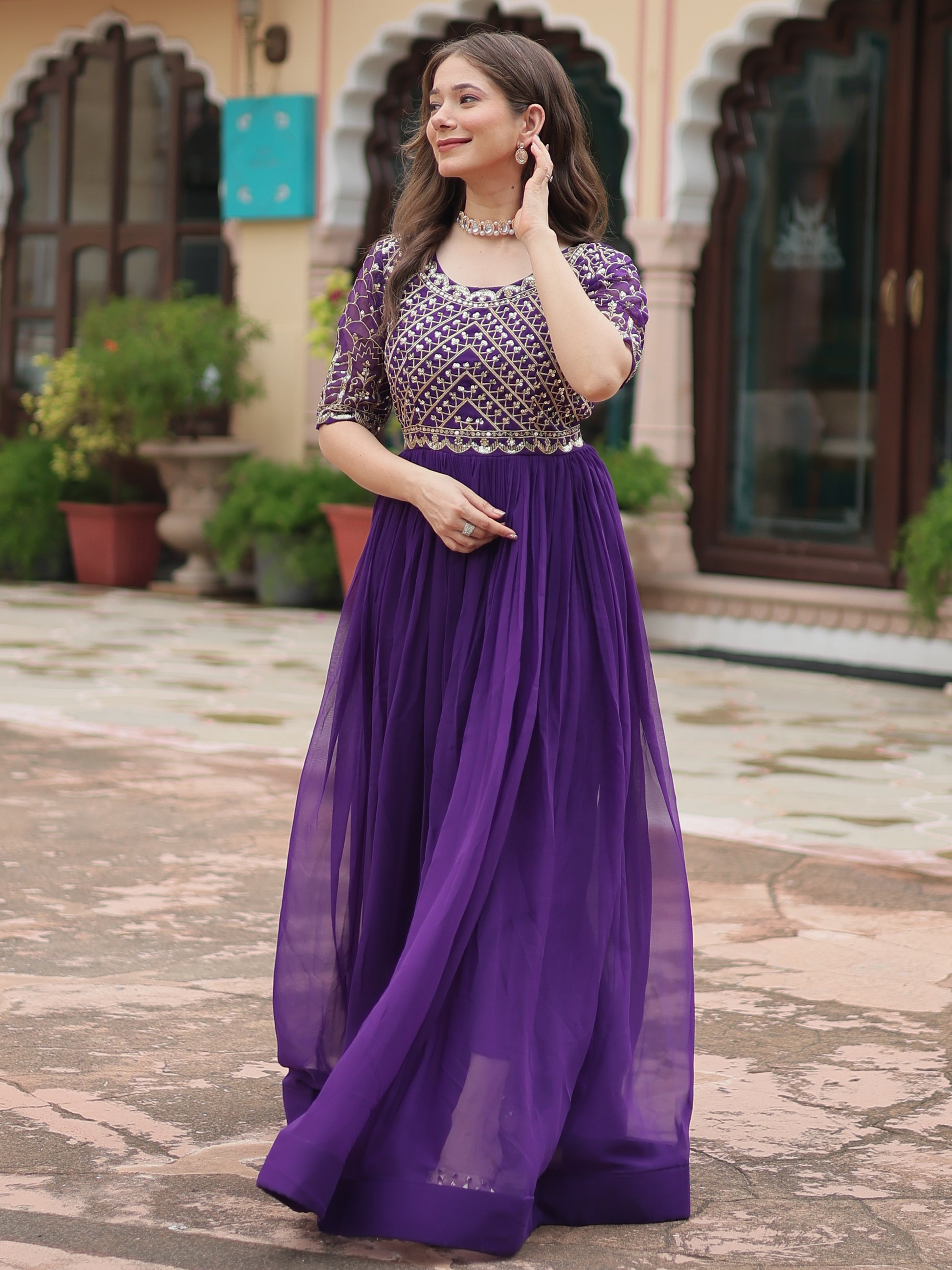 Fabulous Purple Embroidered Georgette Reception Wear Gown