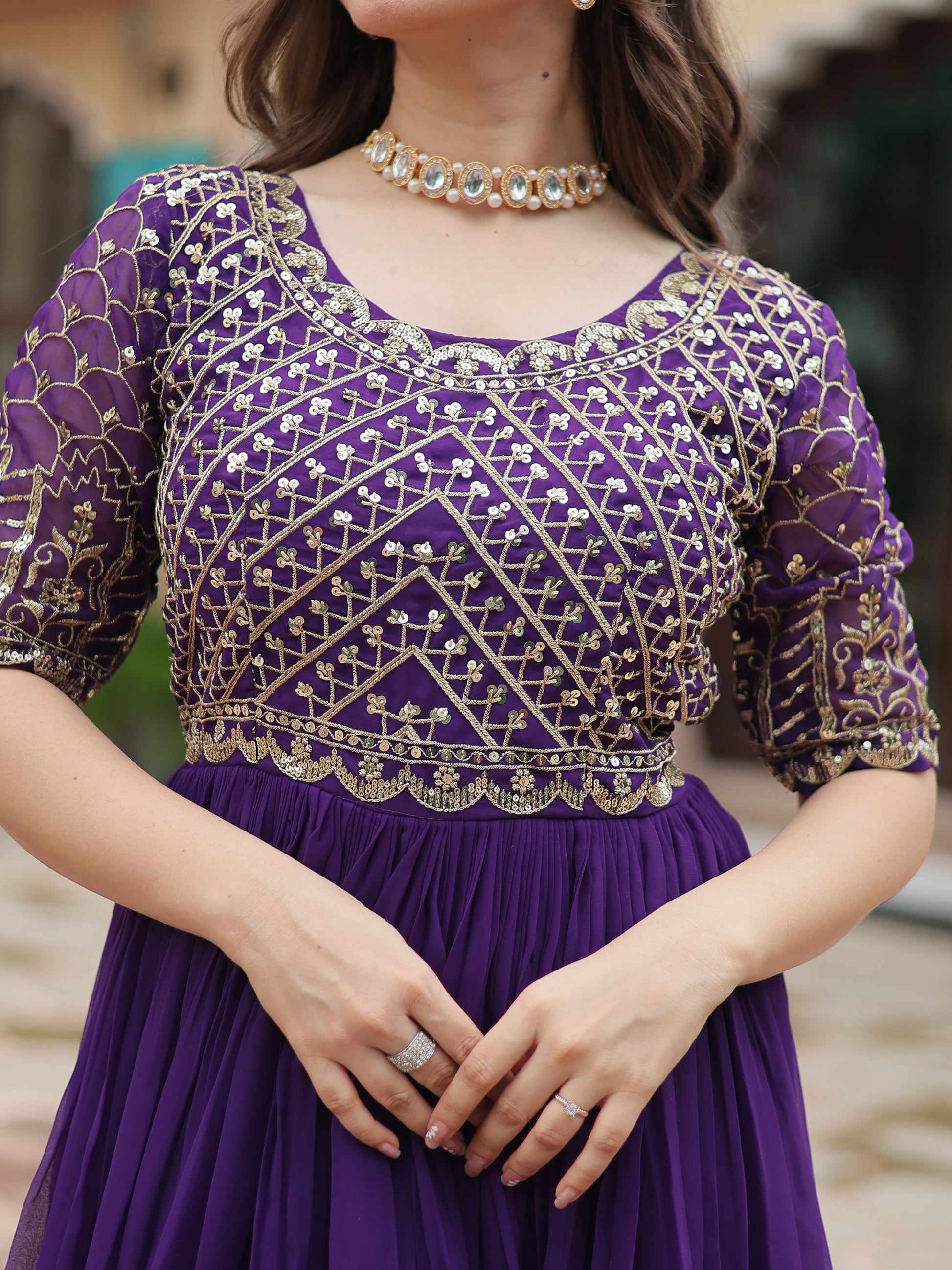 Fabulous Purple Embroidered Georgette Reception Wear Gown