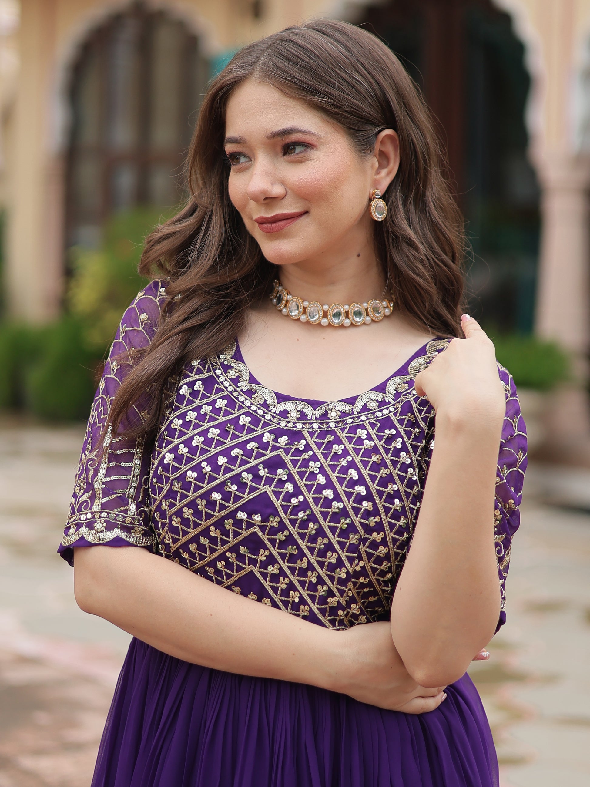 Fabulous Purple Embroidered Georgette Reception Wear Gown
