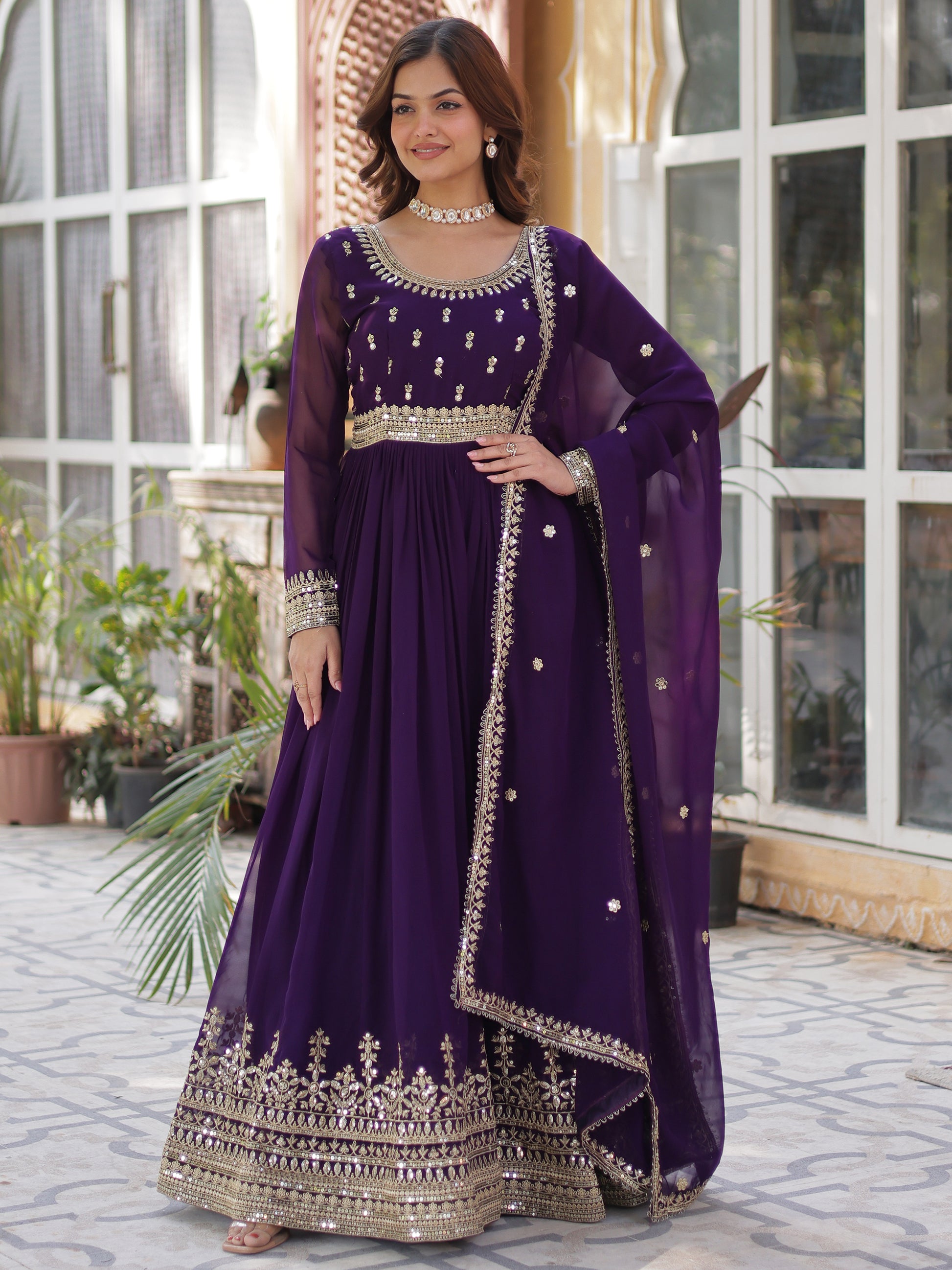 Adorable Purple Zari Embroidered Georgette Festive Wear Gown