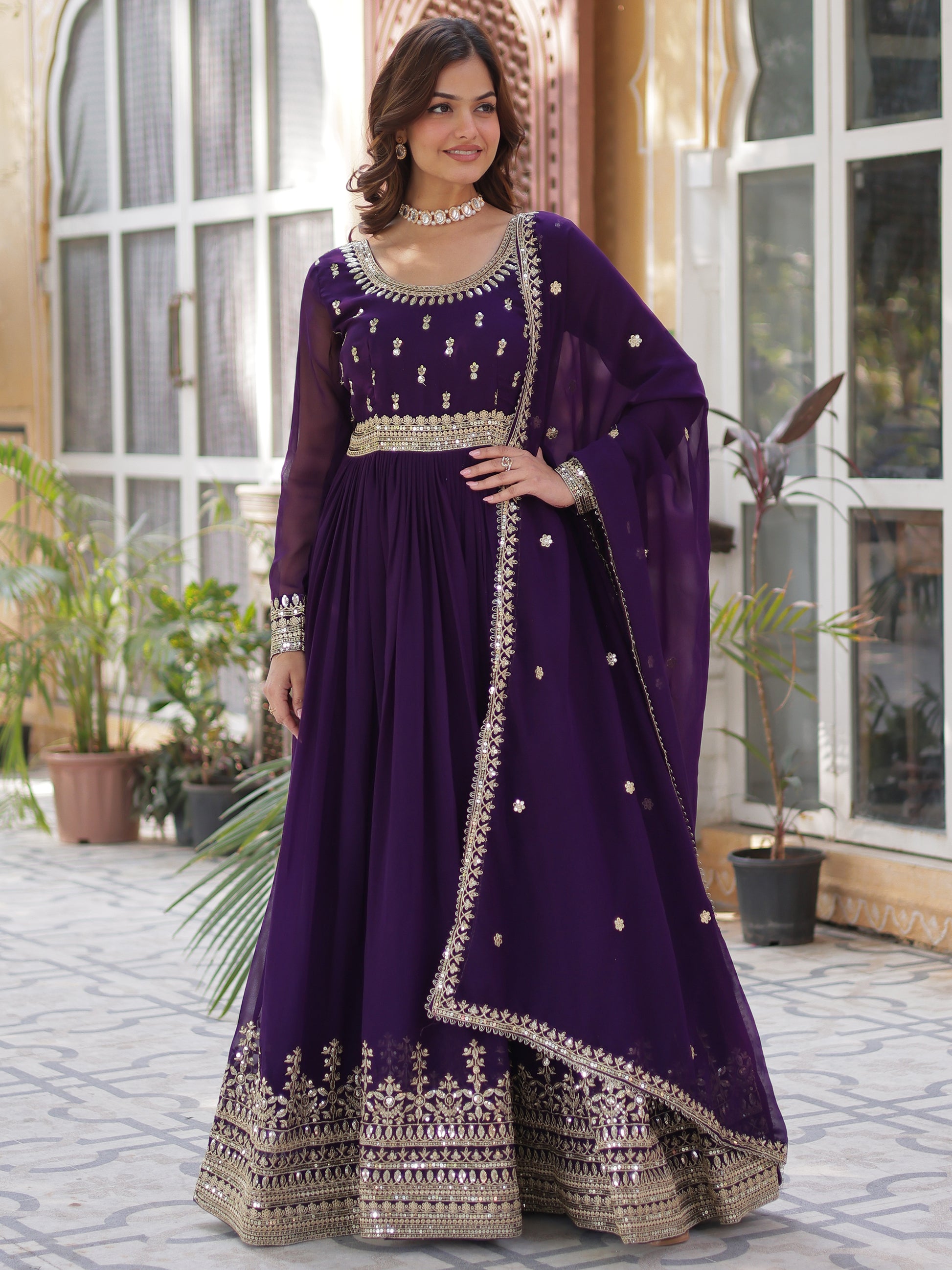 Adorable Purple Zari Embroidered Georgette Festive Wear Gown