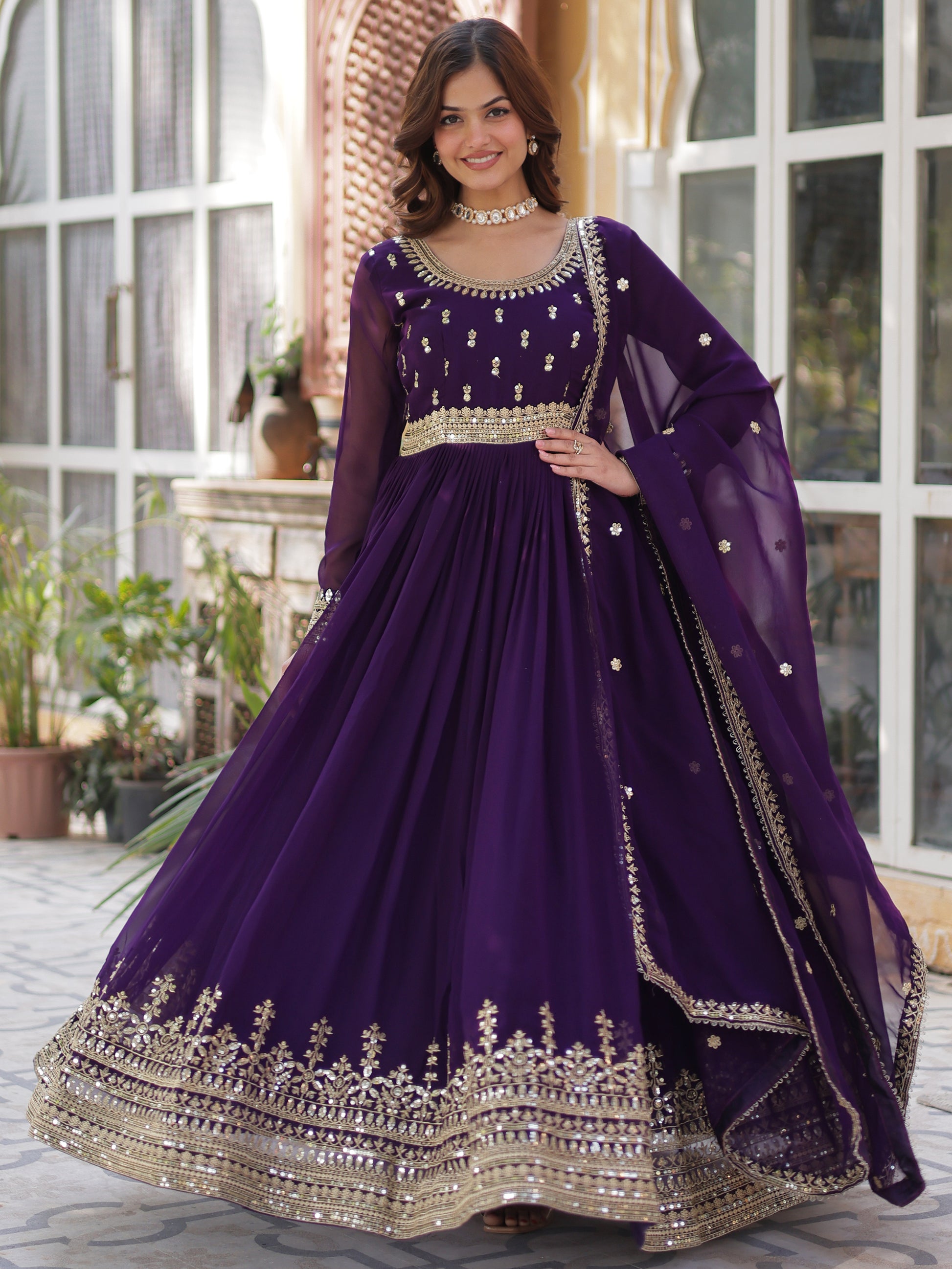 Adorable Purple Zari Embroidered Georgette Festive Wear Gown
