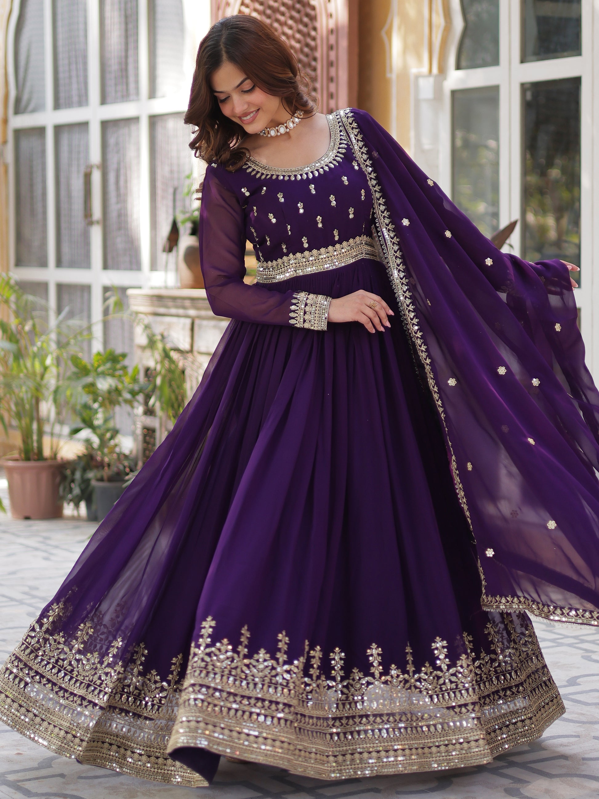 Adorable Purple Zari Embroidered Georgette Festive Wear Gown