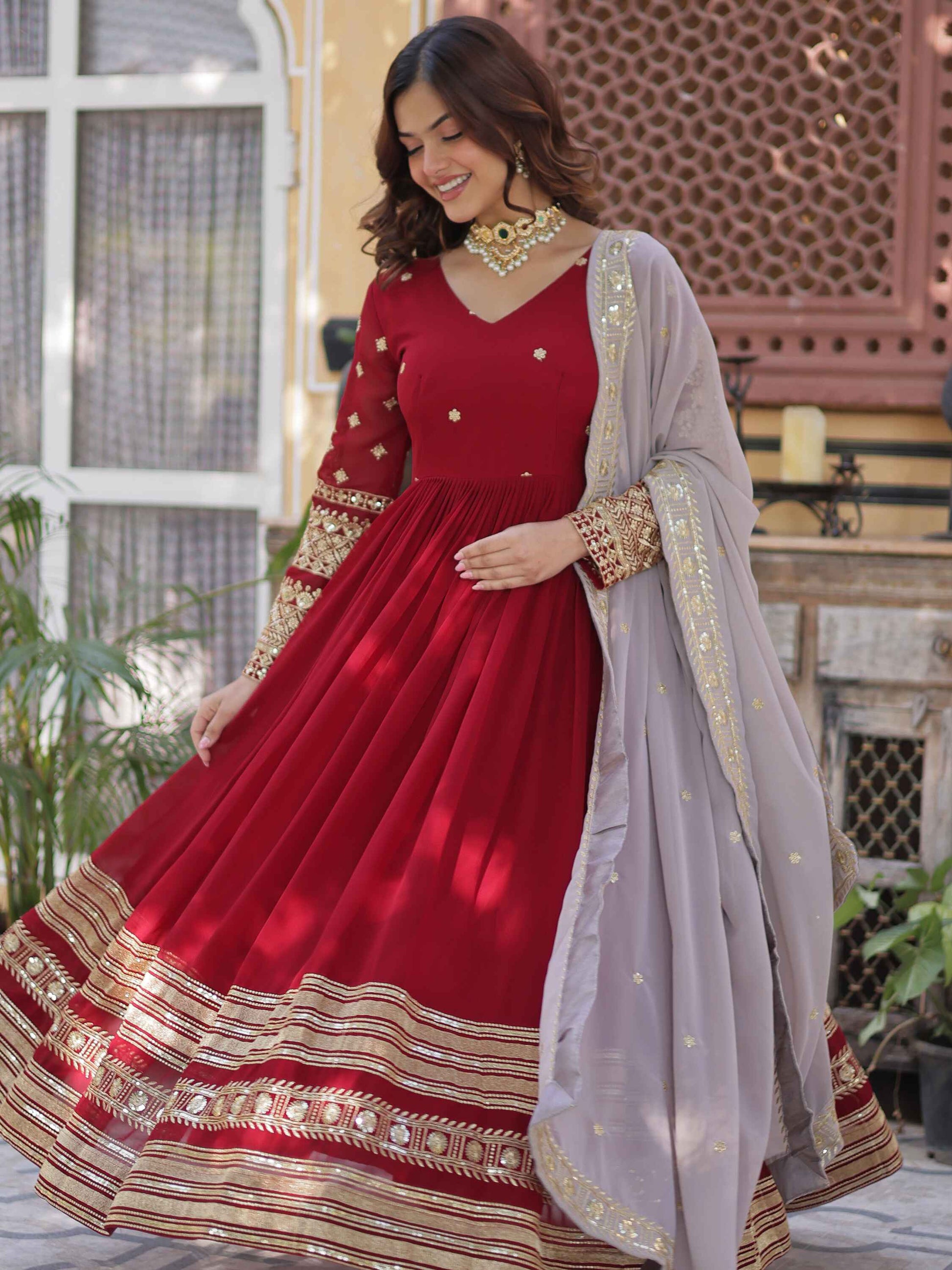 Captivating Red Zari Embroidered Georgette Festival Wear Gown
